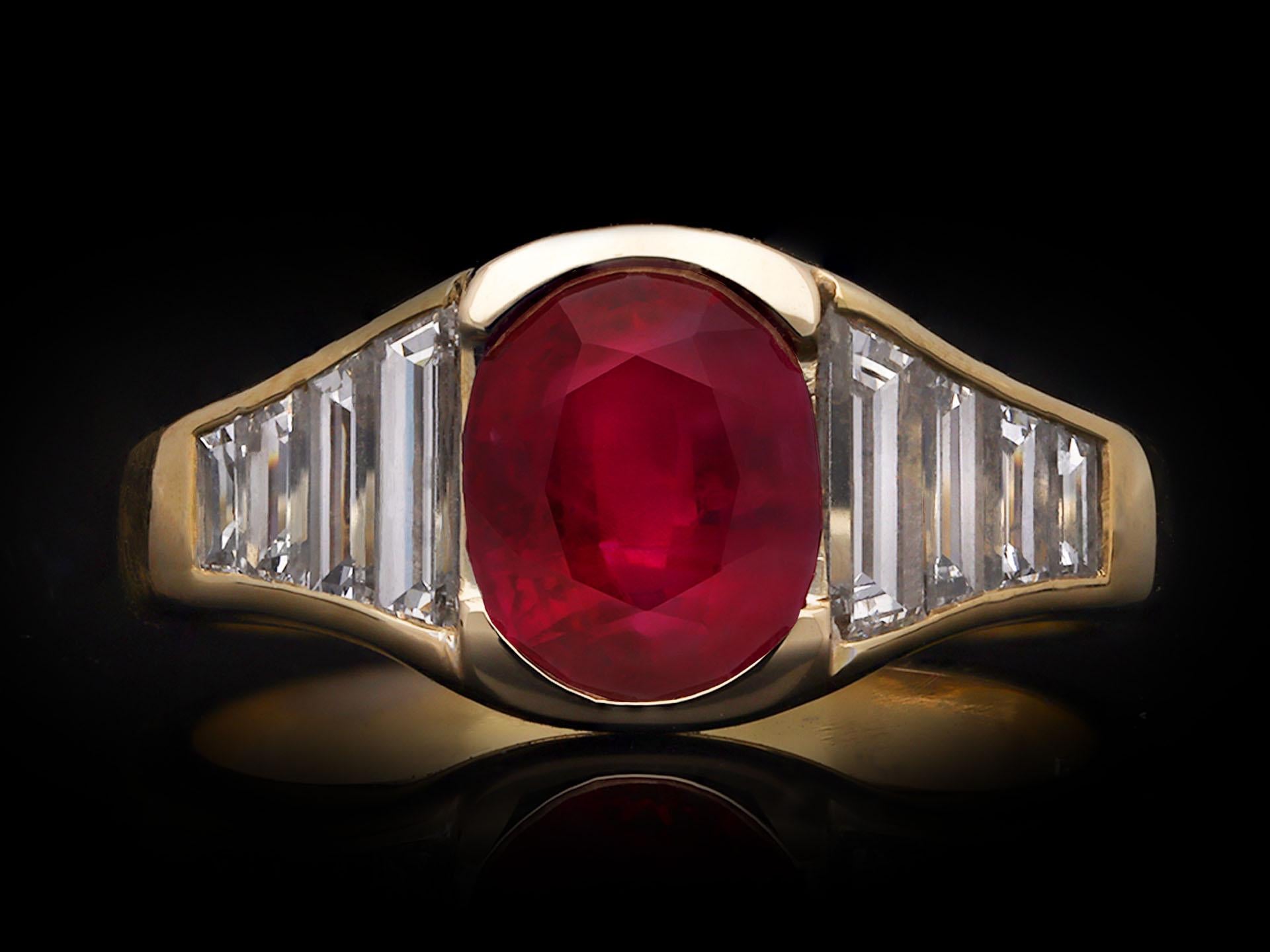 Old European Cut Burmese ruby and diamond flank solitaire ring, circa 1950. For Sale