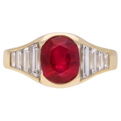 Burmese ruby and diamond flank solitaire ring, circa 1950.