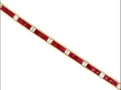 Burmese ruby and diamond line bracelet, circa 1970.