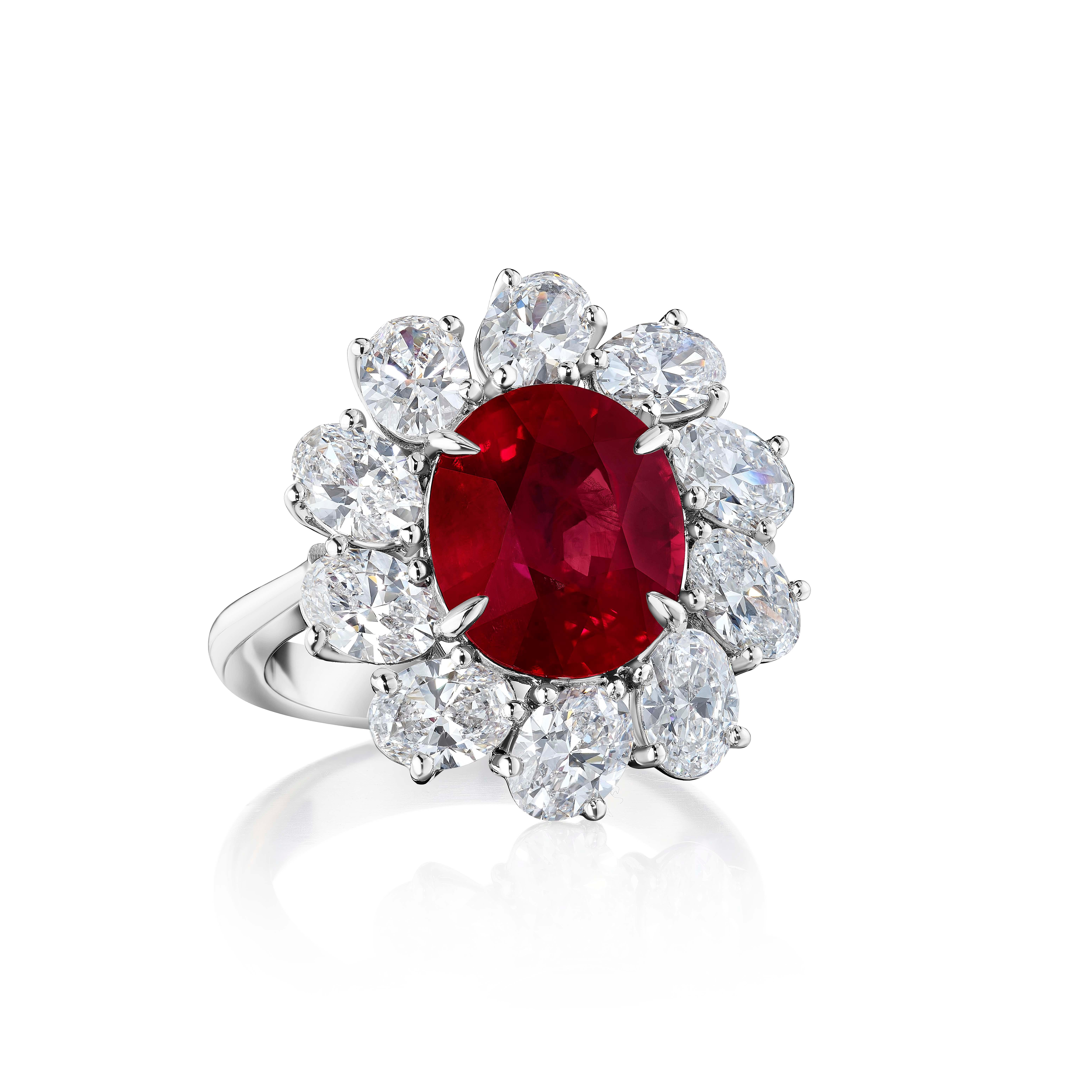 Oval shaped Burmese Ruby surrounded by 10 Oval shaped Diamonds weighing 3.01 Carats.

Ruby certified by GRS as Burma, heated.
Diamonds are all certified as D color and VS+ clarity, by GIA.

Set in Platinum.