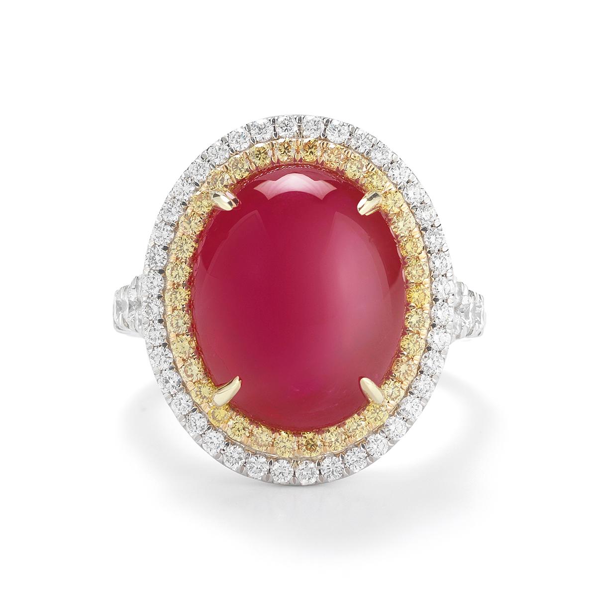 RUBY CABOCHON RING WITH DIAMONDS
A luscious Burmese Ruby takes the focus of this beautiful ring featuring yellow and white diamond halos.
Item:	# 02654
Setting:	Platin;18K
Lab:	        C.Dunaigre
Color Weight: 	 14.25 ct. of Ruby
Diamond