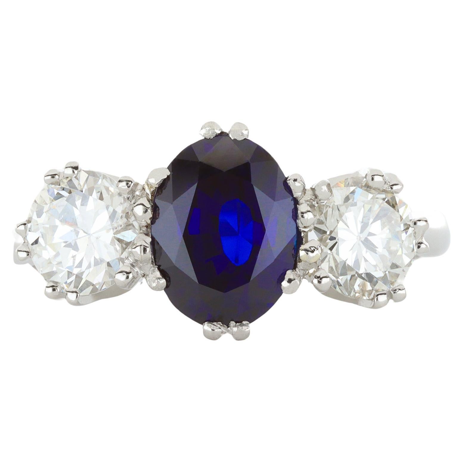 Burmese sapphire and diamond three stone ring, circa 1950.  For Sale