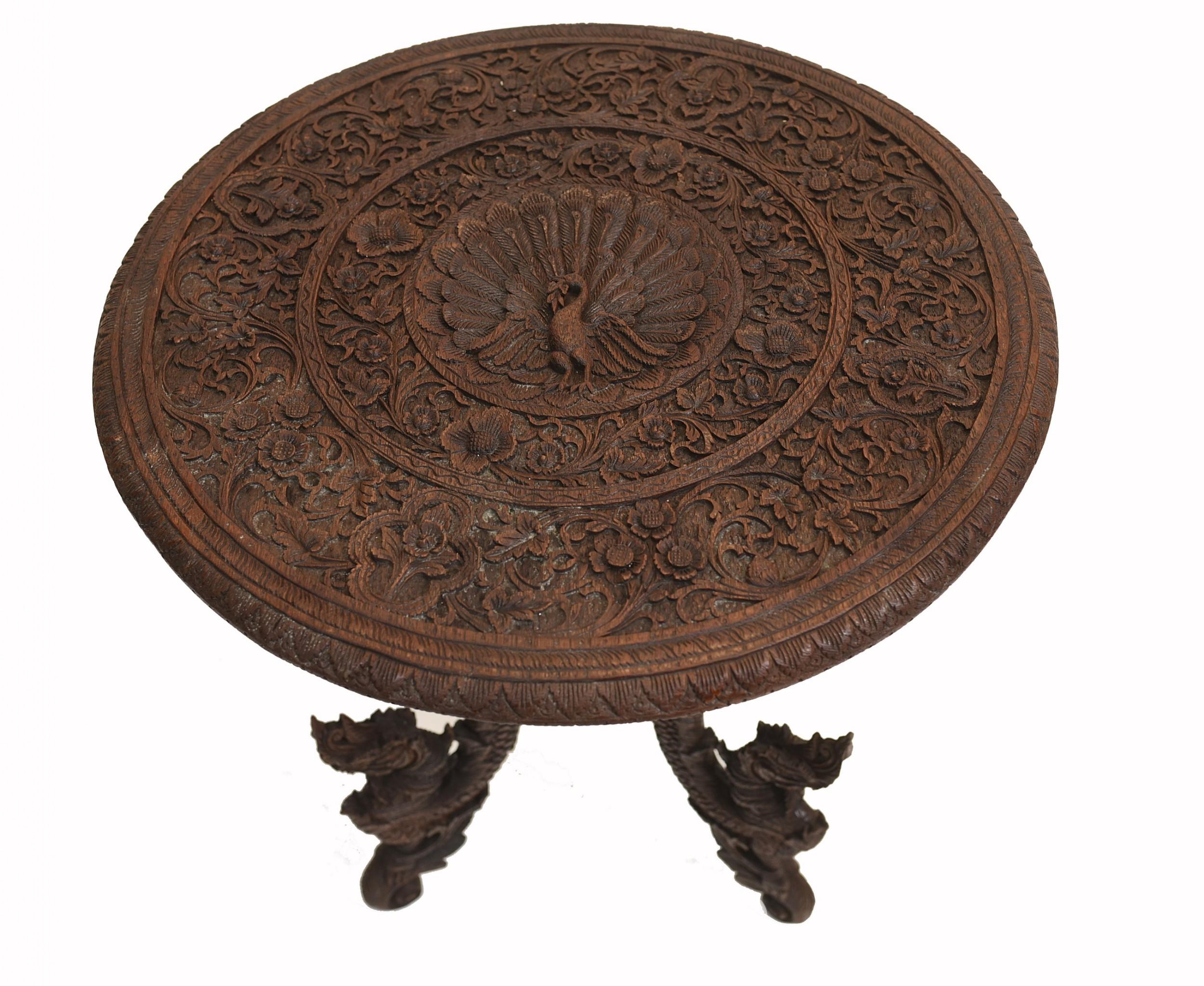 Stylish Burmese antique side table
Classic Burmese furniture with amazingly intricate hand carved details
We date this to circa 1890
Antiques Herts showroom, just 25 minutes north of London
Offered in great shape ready for home use right
