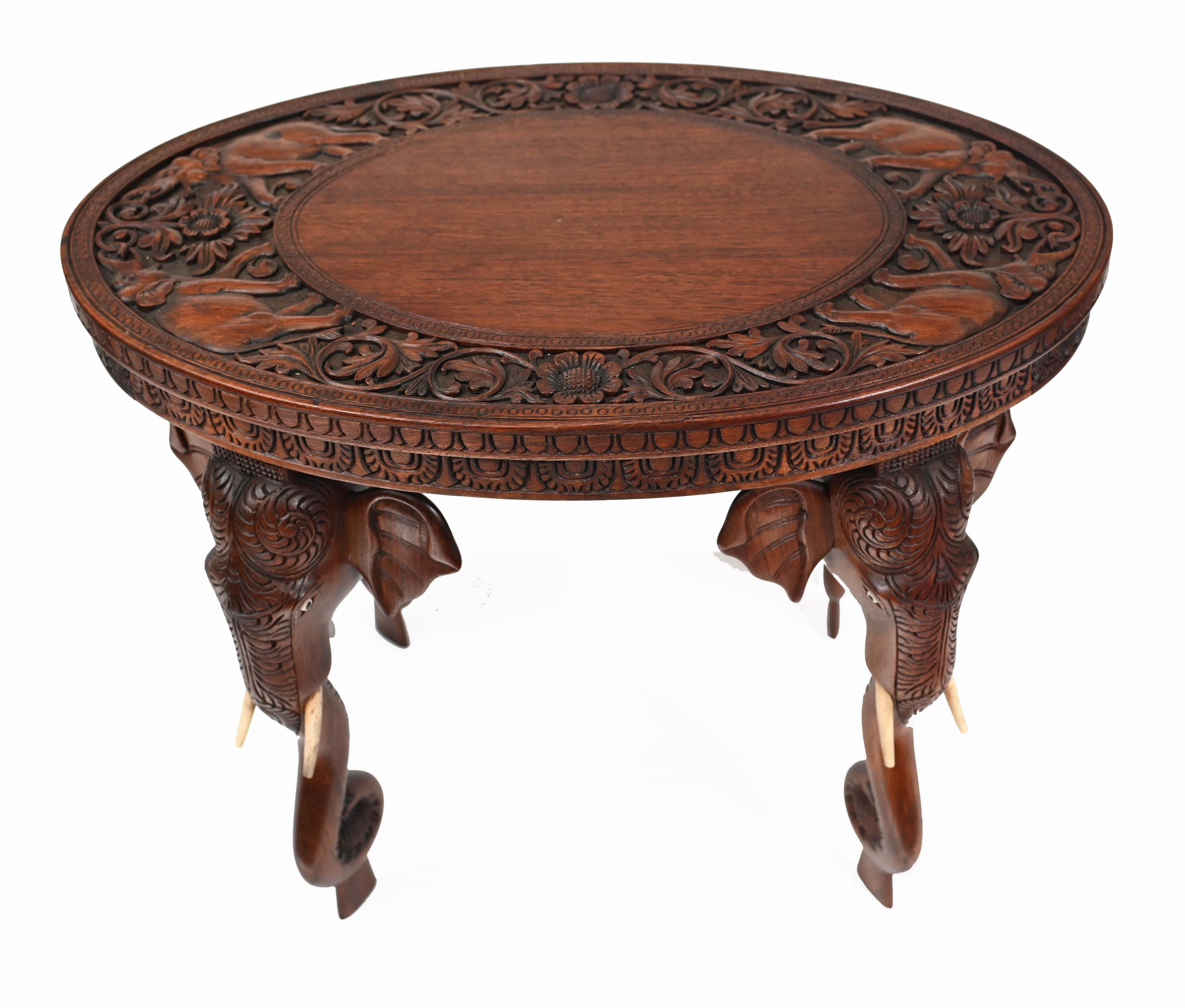 Gorgeous Burmese side table with hand carved elephant legs
Very distinctive look on this table we date to circa 1890
Offered in great shape ready for home use right away
We ship to every corner of the planet.
 