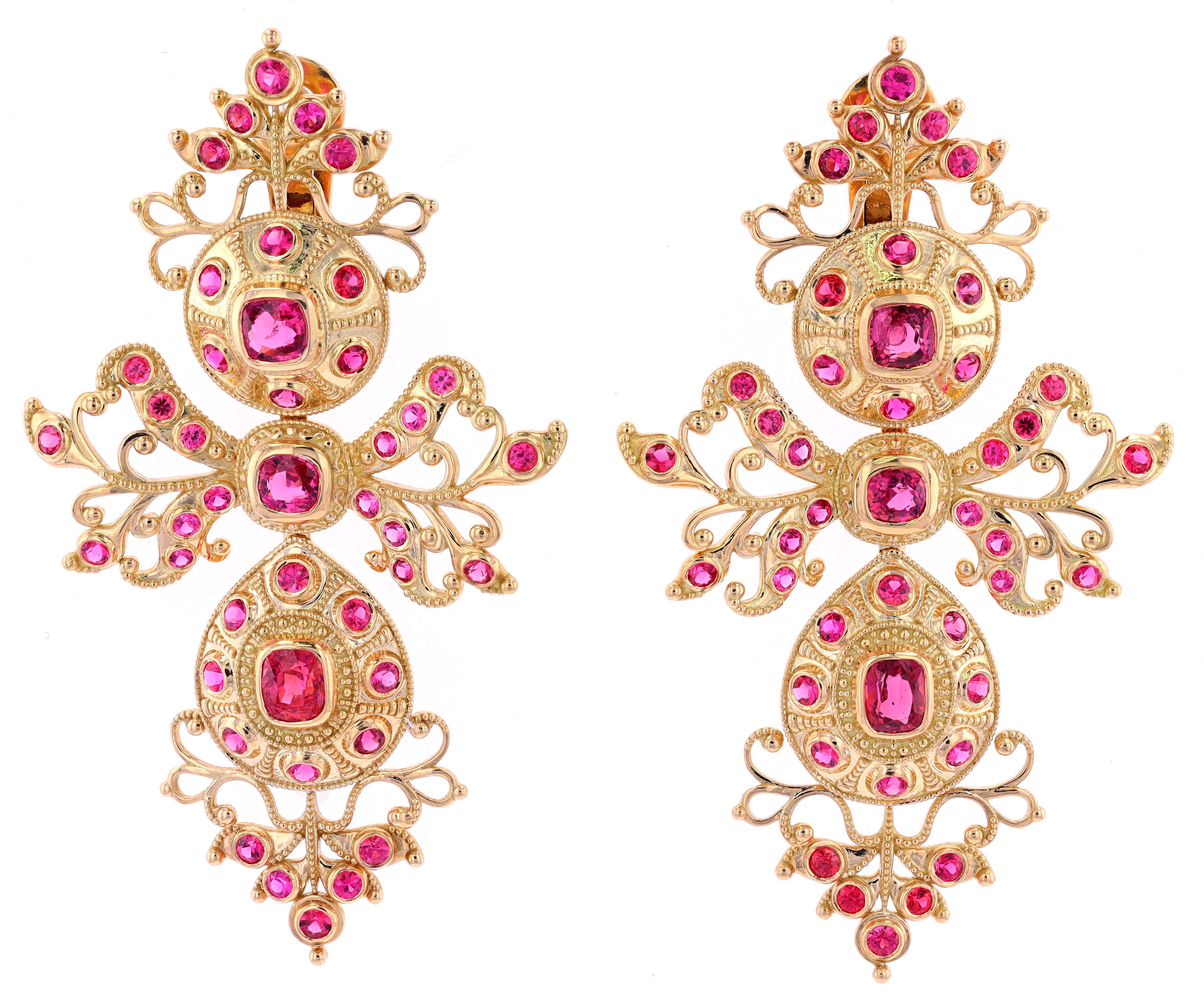 Inspired by Iberian jewelry of the 18th century, these earrings are set with cushion and circular-cut spinel, mounted in 18K gold. The earrings are richly textured and dramatic. 

If you are a Bridgerton, The Crown or a Downton Abbey fan, these are