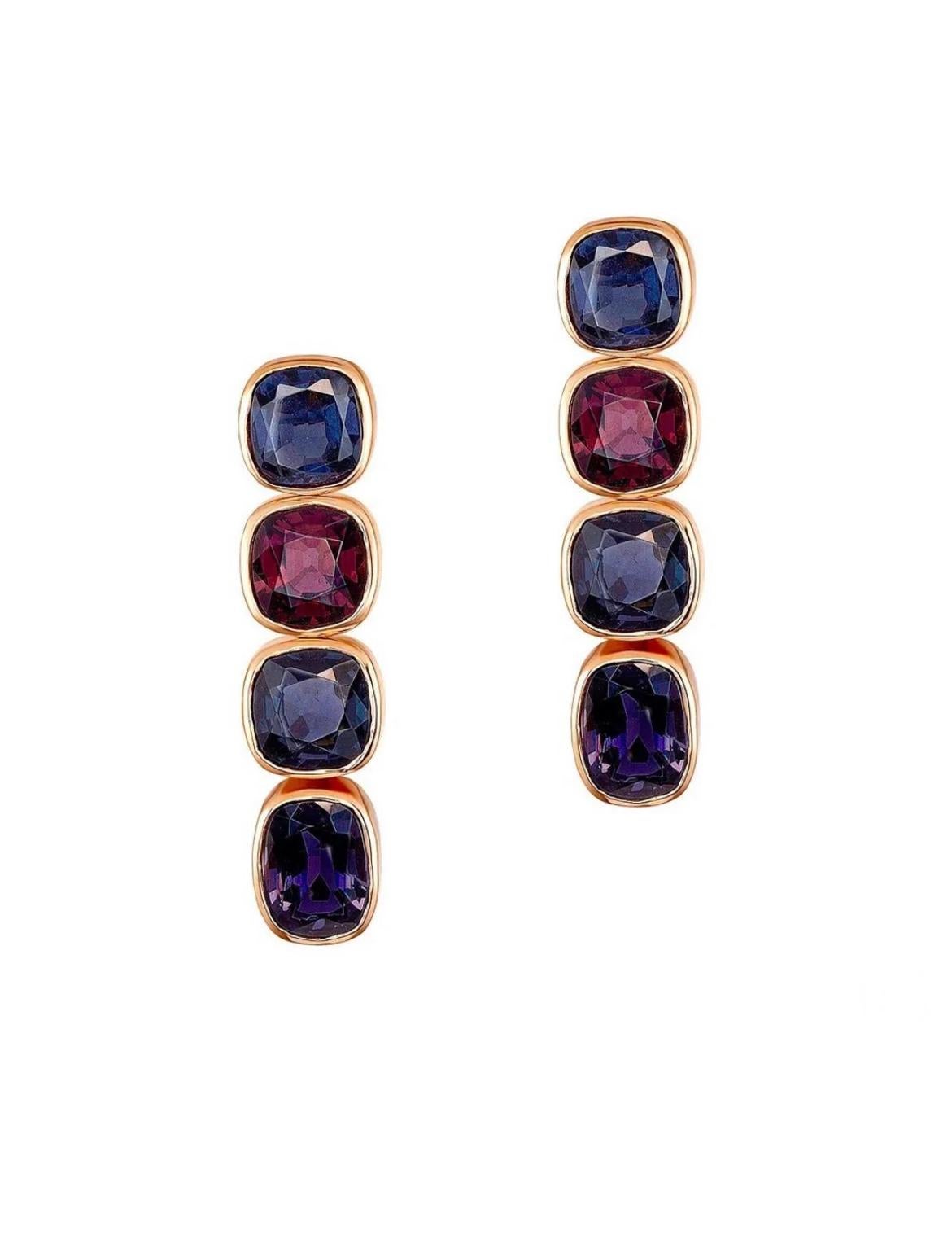 Eight untreated Burmese Spinels totaling 24.13 carats, present a distinctive coloration of hues in these exuberant 18K rose gold earrings. 