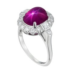 Anello con stella birmana, rubino e diamante a grappolo