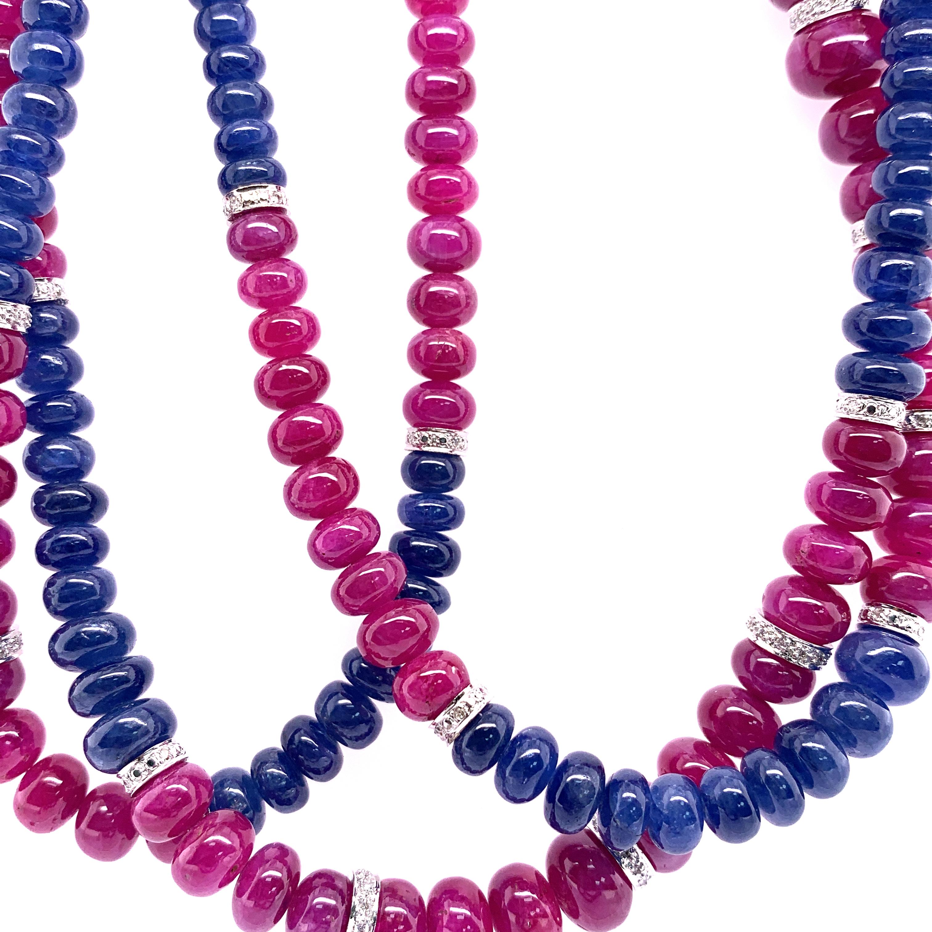 Burmese Unheated Ruby and Sapphire Beads White Diamond Gold Necklace:

A beautiful necklace, it features luscious unheated Burmese ruby and blue sapphire beads weighing 567.37 carat and 555.51 carat respectively, with 57 white round brilliant