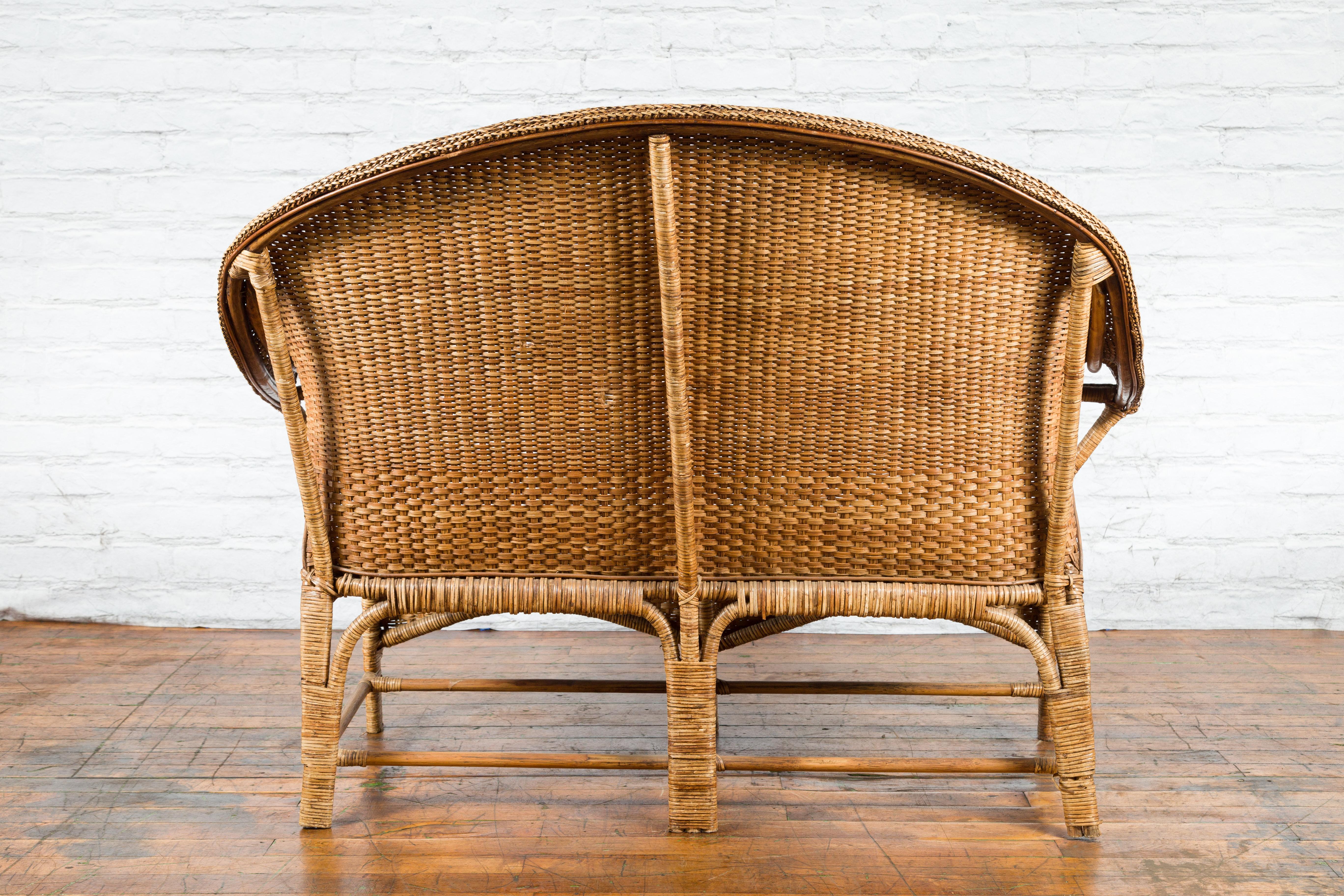 Burmese Vintage Rattan and Wood Loveseat with Curving Back and Unusual Arms For Sale 7