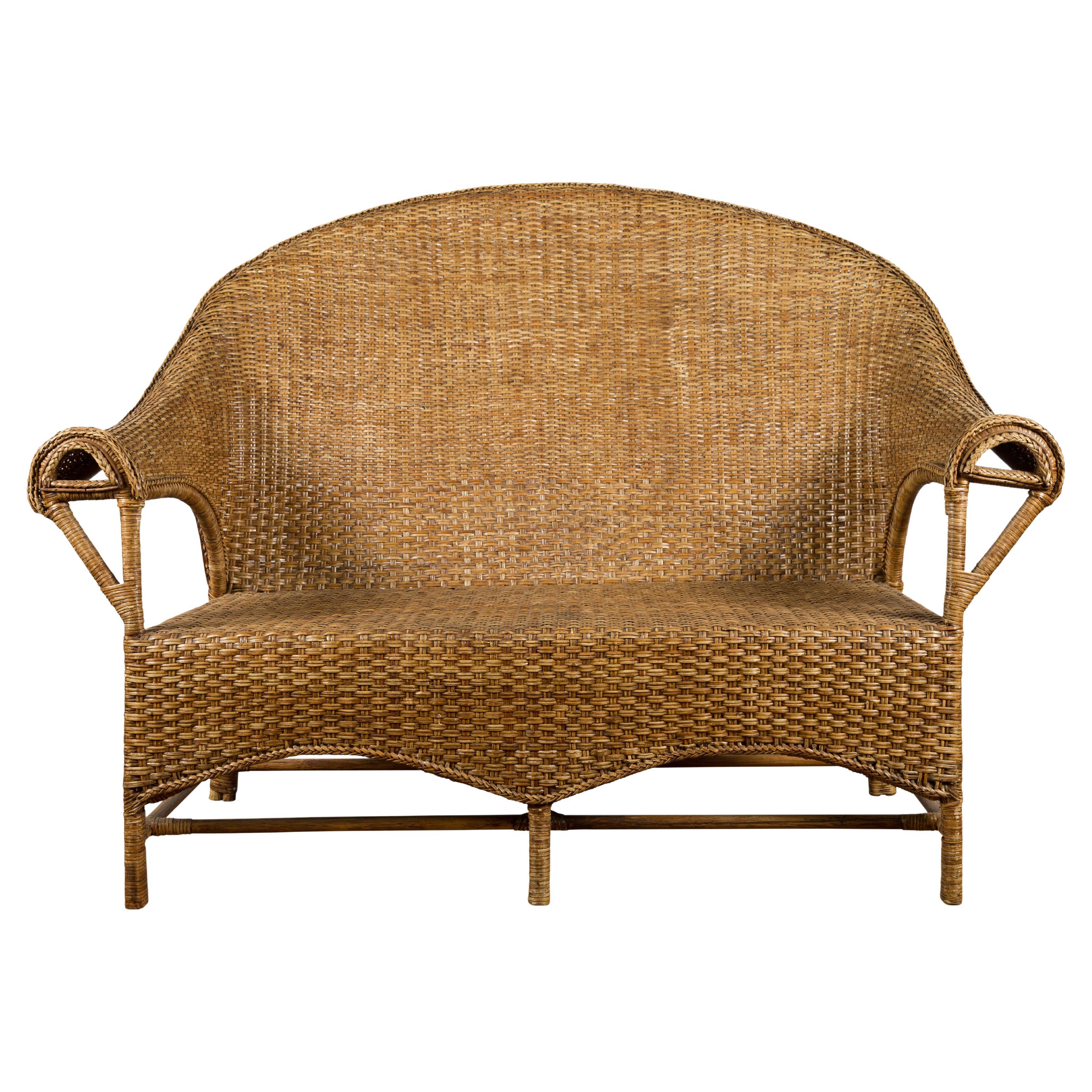 Burmese Vintage Rattan and Wood Loveseat with Curving Back and Unusual Arms For Sale