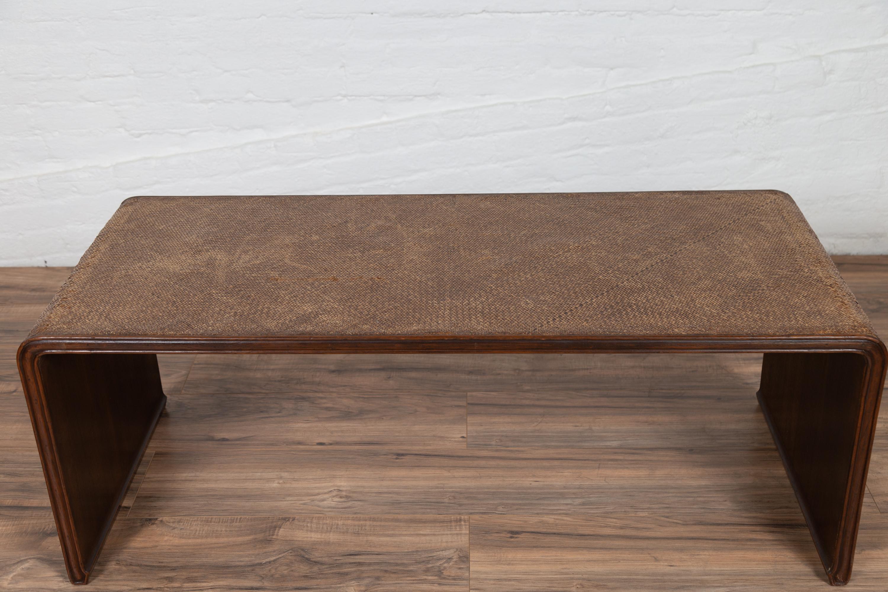 Burmese Vintage Waterfall Coffee Table with Rattan Cover Mounted on Wooden Frame 1