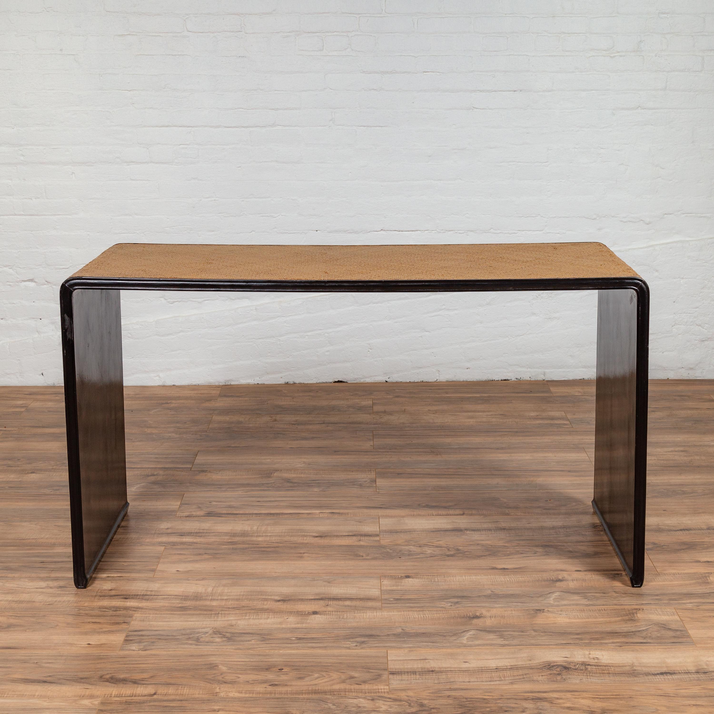 black waterfall console table