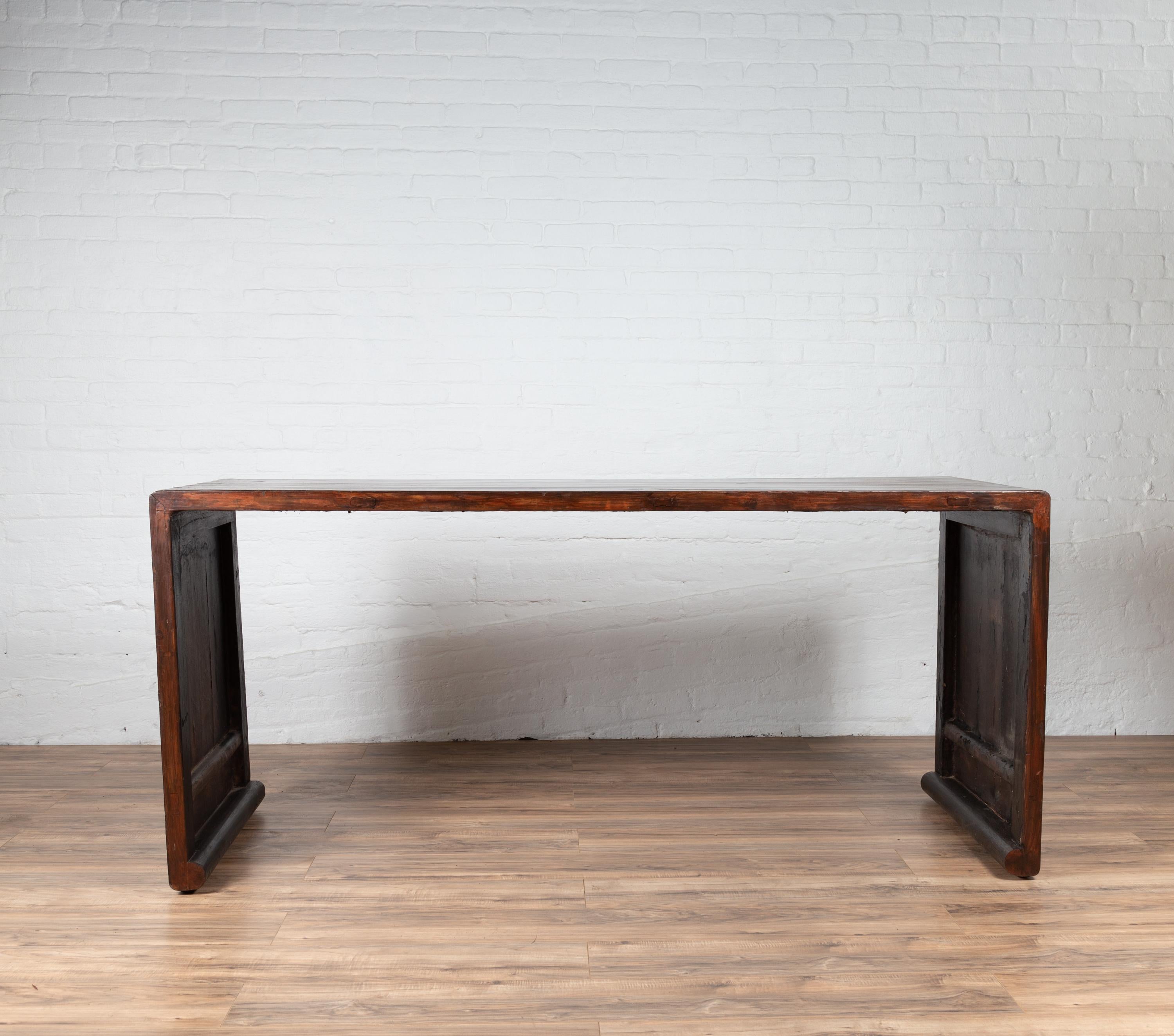 Burmese Vintage Waterfall Console Table with Scrolling Feet and Dark Patina In Good Condition For Sale In Yonkers, NY