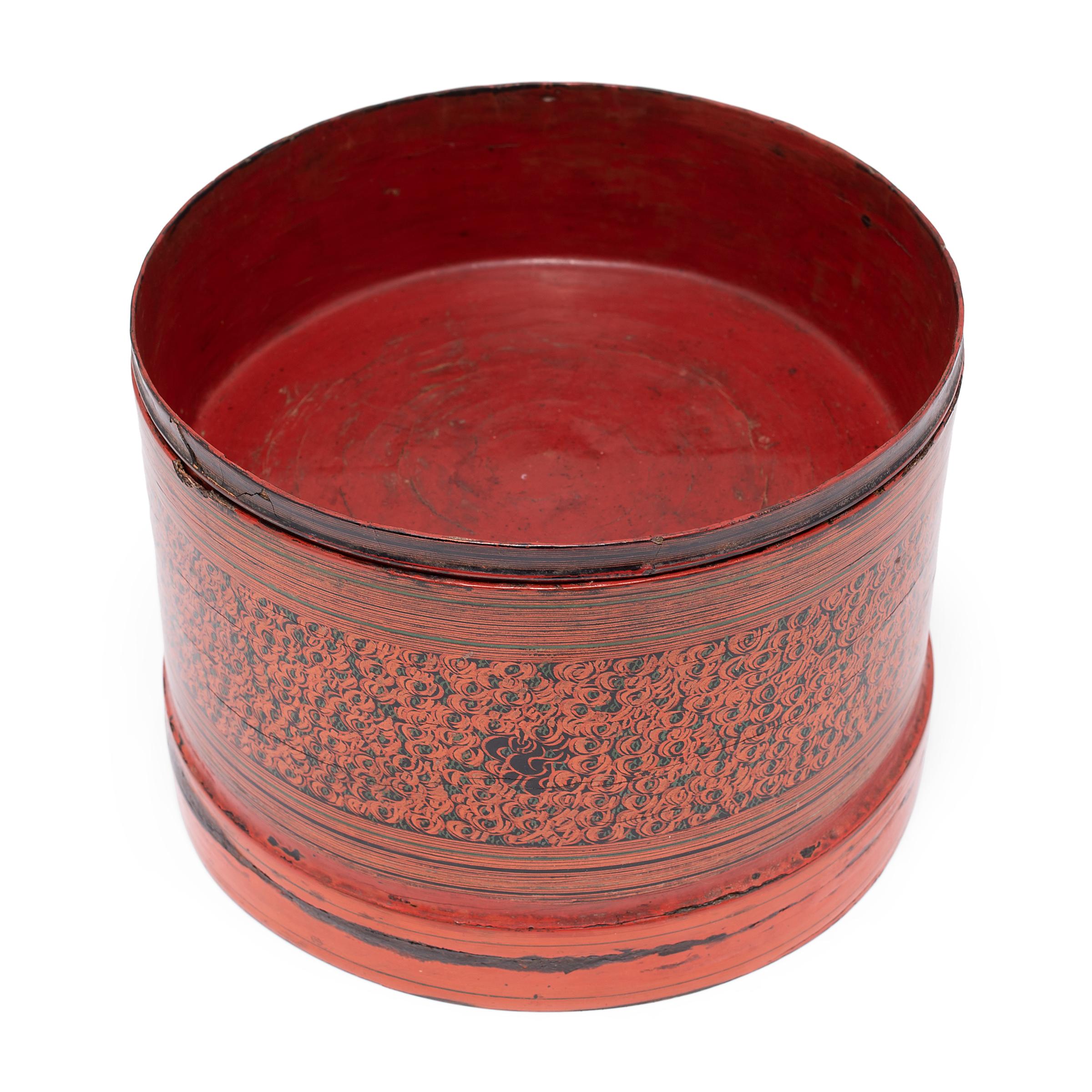 In many southeast Asian cultures, offering guests a betel quid to chew was the fundamental symbol of hospitality. A blend of leaves, nuts, seasonings, and sometimes tobacco, betel was kept in finely worked and decorated boxes. This round Burmese