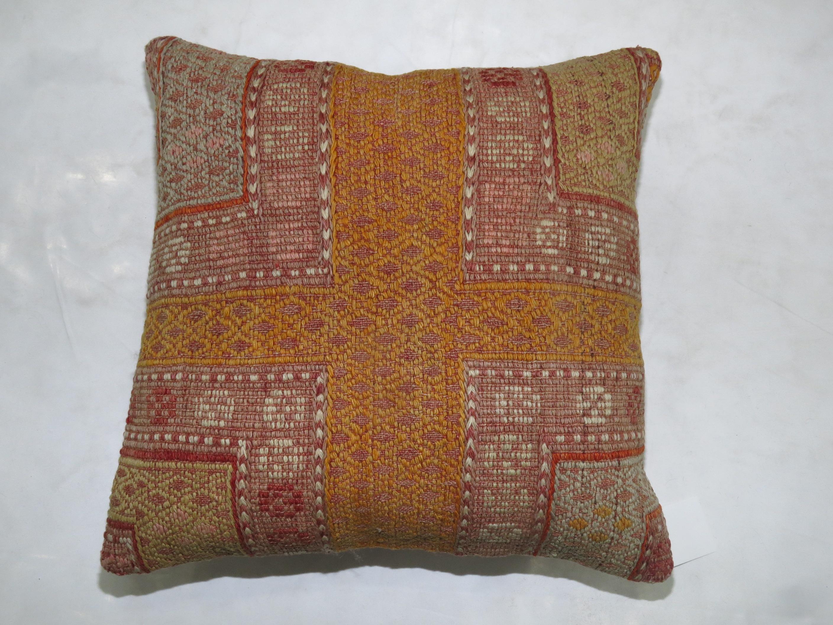 Large pillow made from a colorful Turkish Jajim flat-weave.

Measures: 20” x 20”.