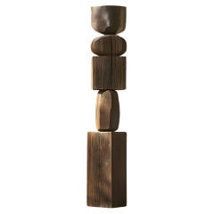 Burned Oak Sculpture, Abstract Elegance by Escalona, Captured in Still Stand 85