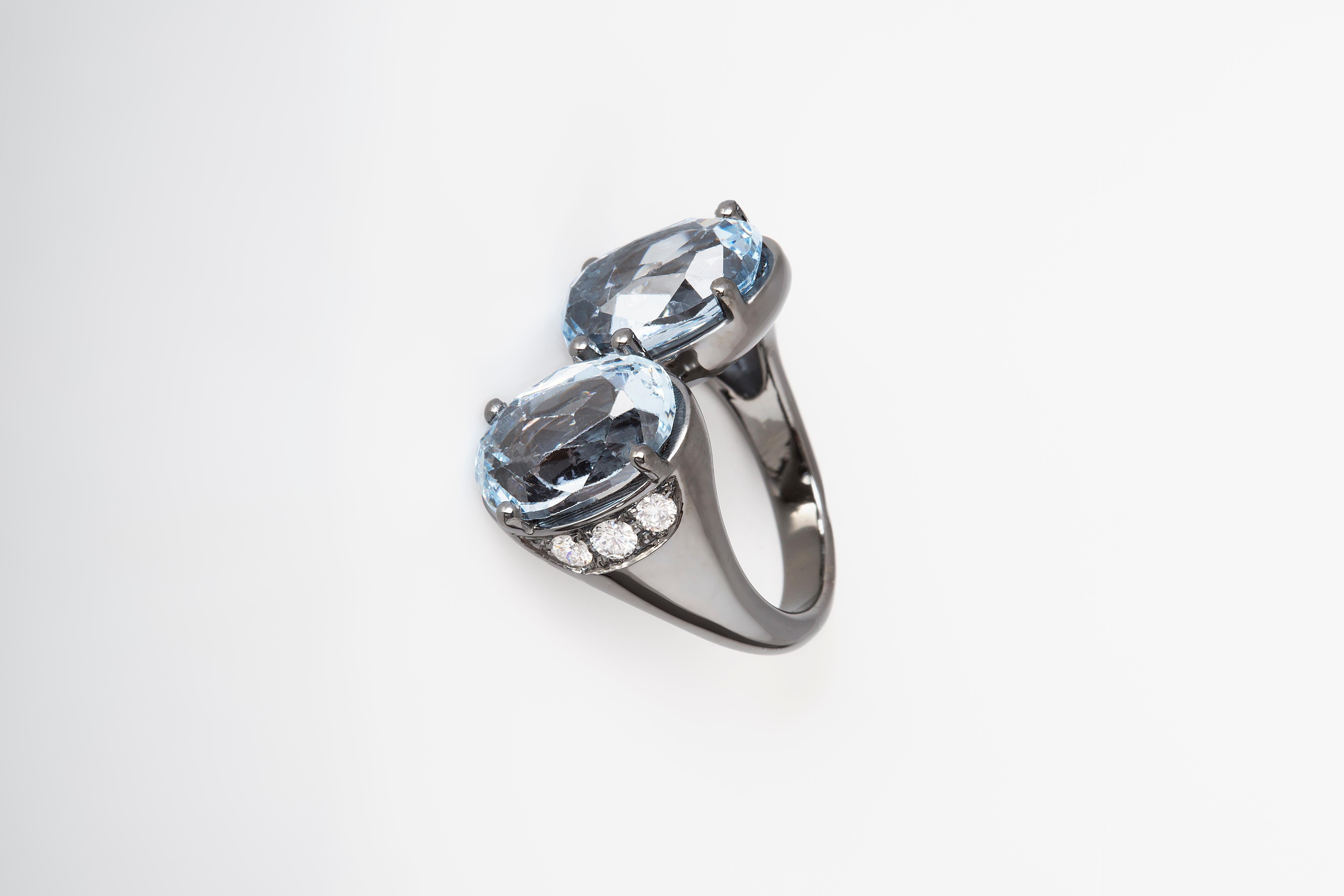 Oval Cut Burnished 18 Karat White Gold White Diamonds Blue Topaz Design Cocktail Ring For Sale