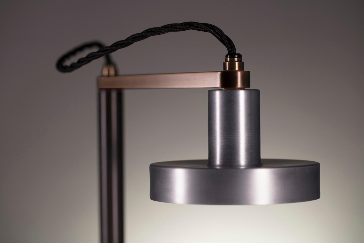 Collection I: Delta lamp

A modern reinterpretation of the industrial work light, the delta lamp rotates 360° to focus subtle lighting where it is needed most.

Dimensions:
16.5” L x 7” W x 15.5” H

Made to order.