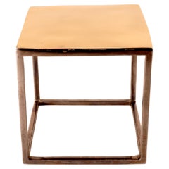 Pulsera cúbica de latón bruñido. Por Stefania Bosio para Ornamenta. Italia, 2000.