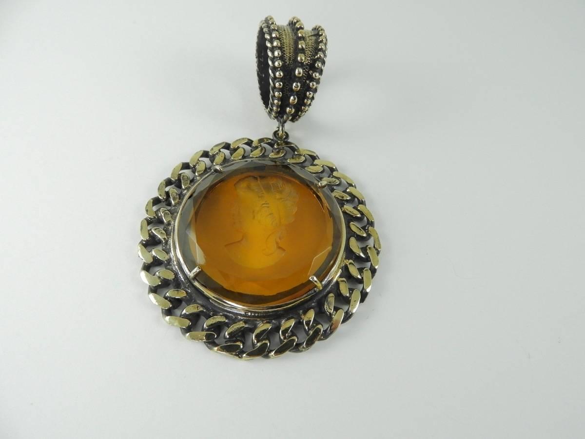 Neoclassical  Burnished bronze pendant with engraved Murano Glass insert.