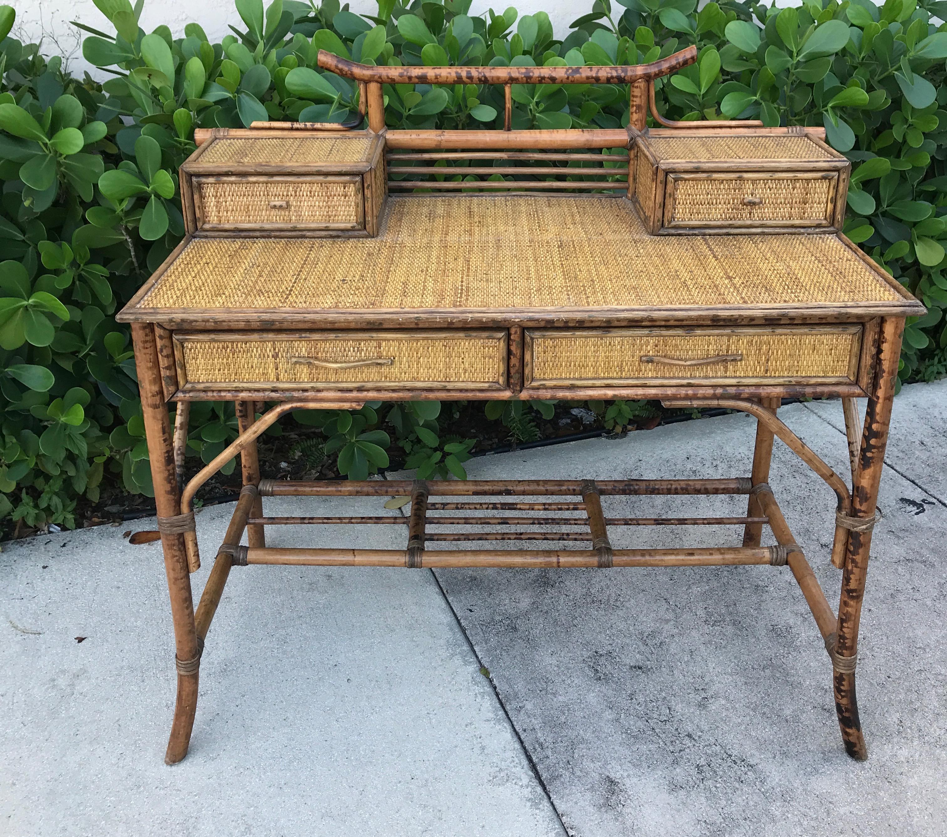 Vintage burnt bamboo Pagoda style desk and chair set.