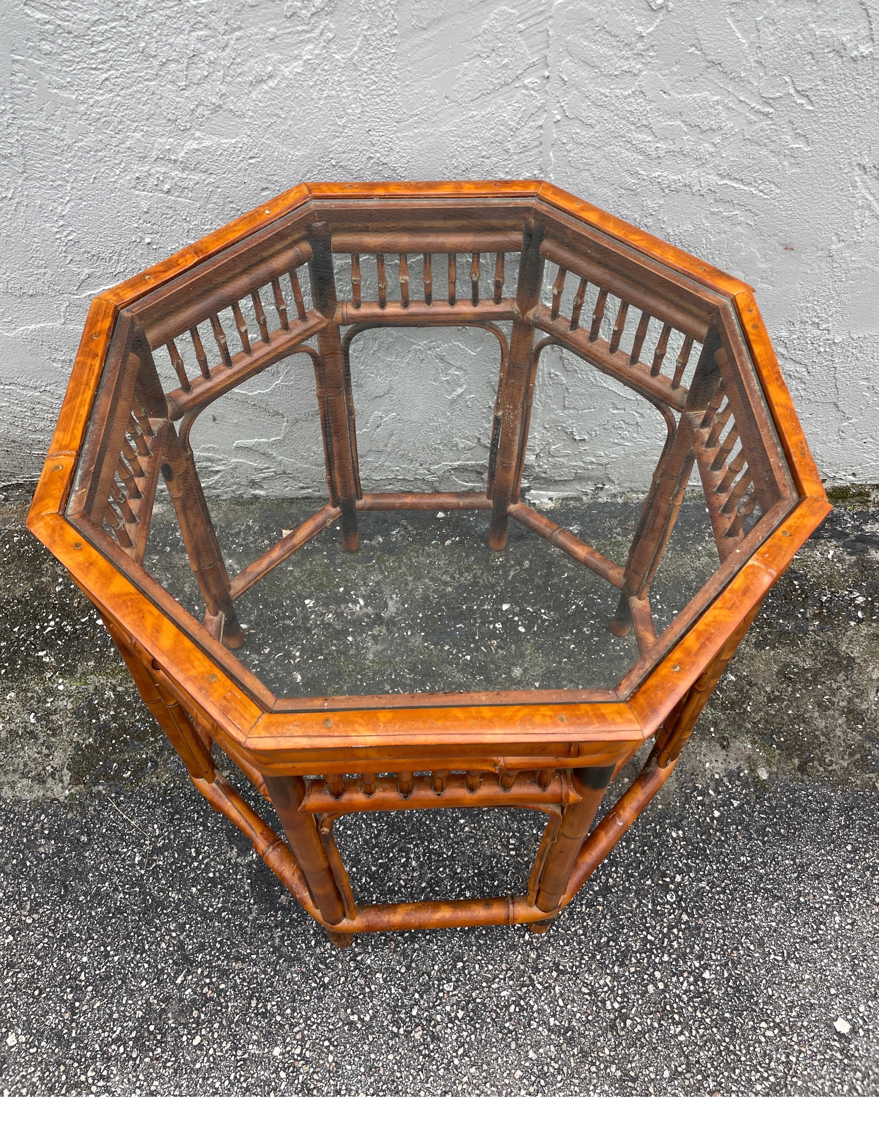 Vintage Burnt bamboo octagon shaped Brighton Pavillion side table with glass top.