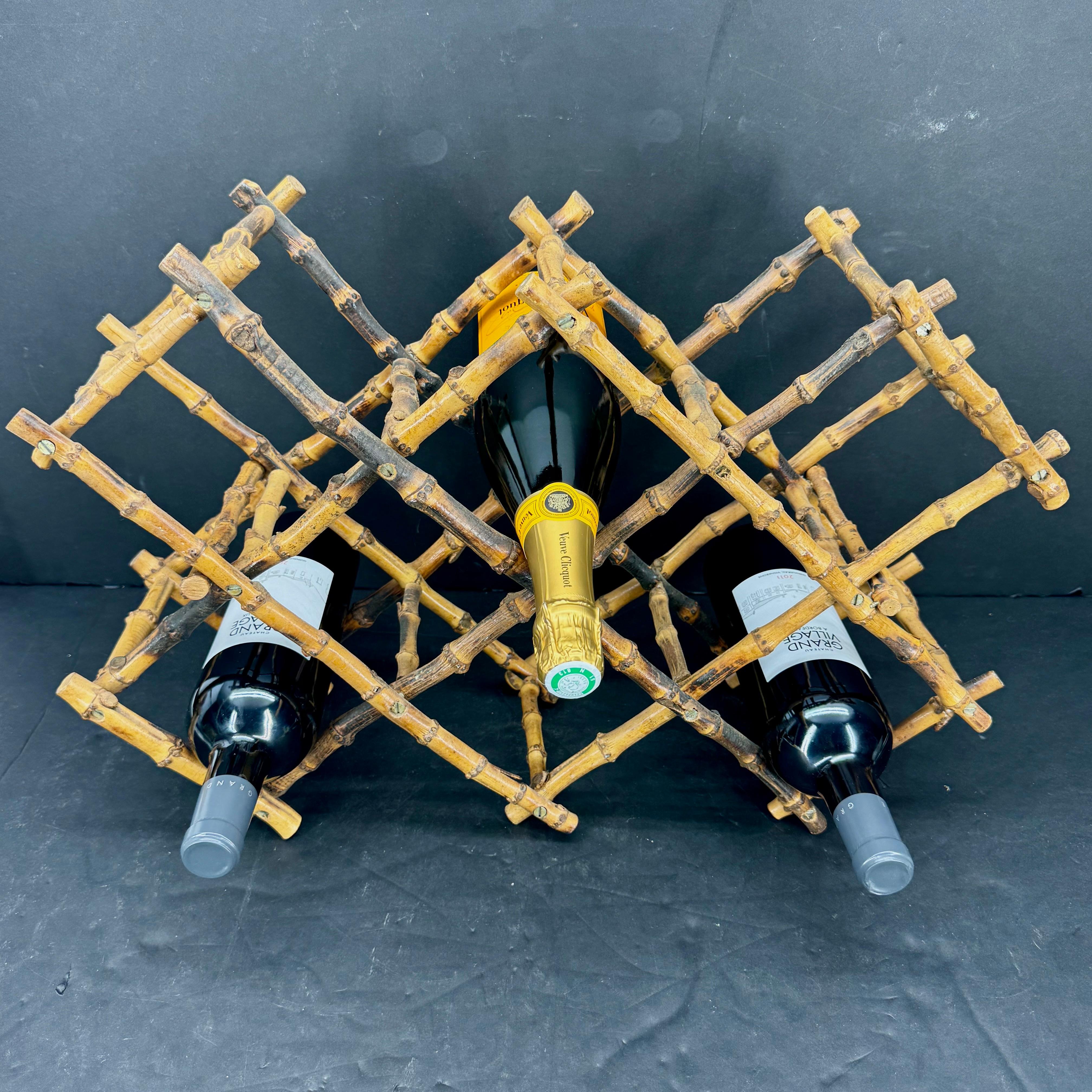 Mid-Century Modern wine champagne bottle display that is collapsable. This vintage piece would look fantastic sitting on a kitchen counter as well as in a bar area. 