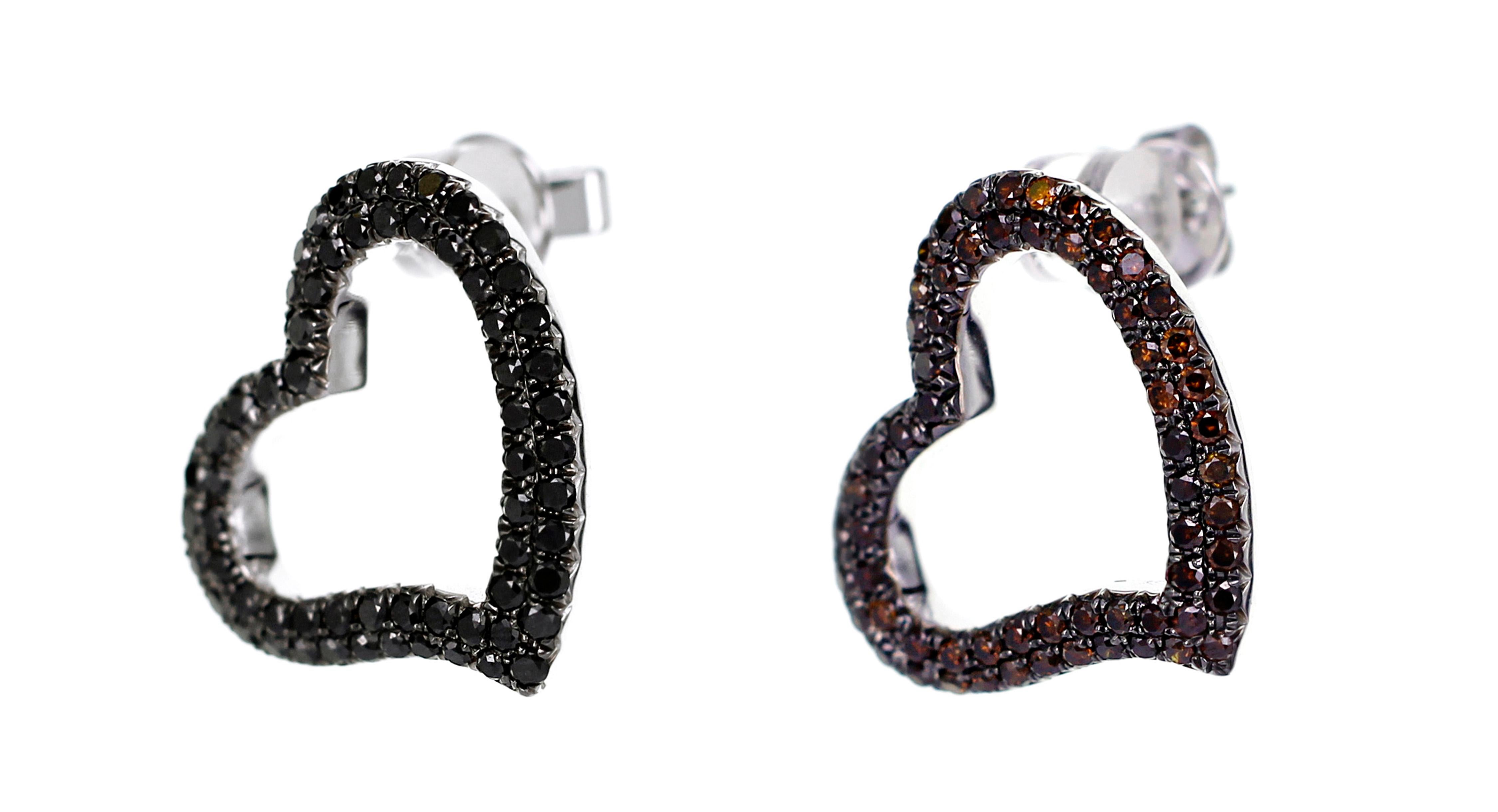 A rare combination of 0.84 carats of Burnt Color natural diamond with 0.91 carats of Black diamond are studded in this heart shape cute earrings. The  earring can be worn  together or can be used as a single ear jewelry. 
