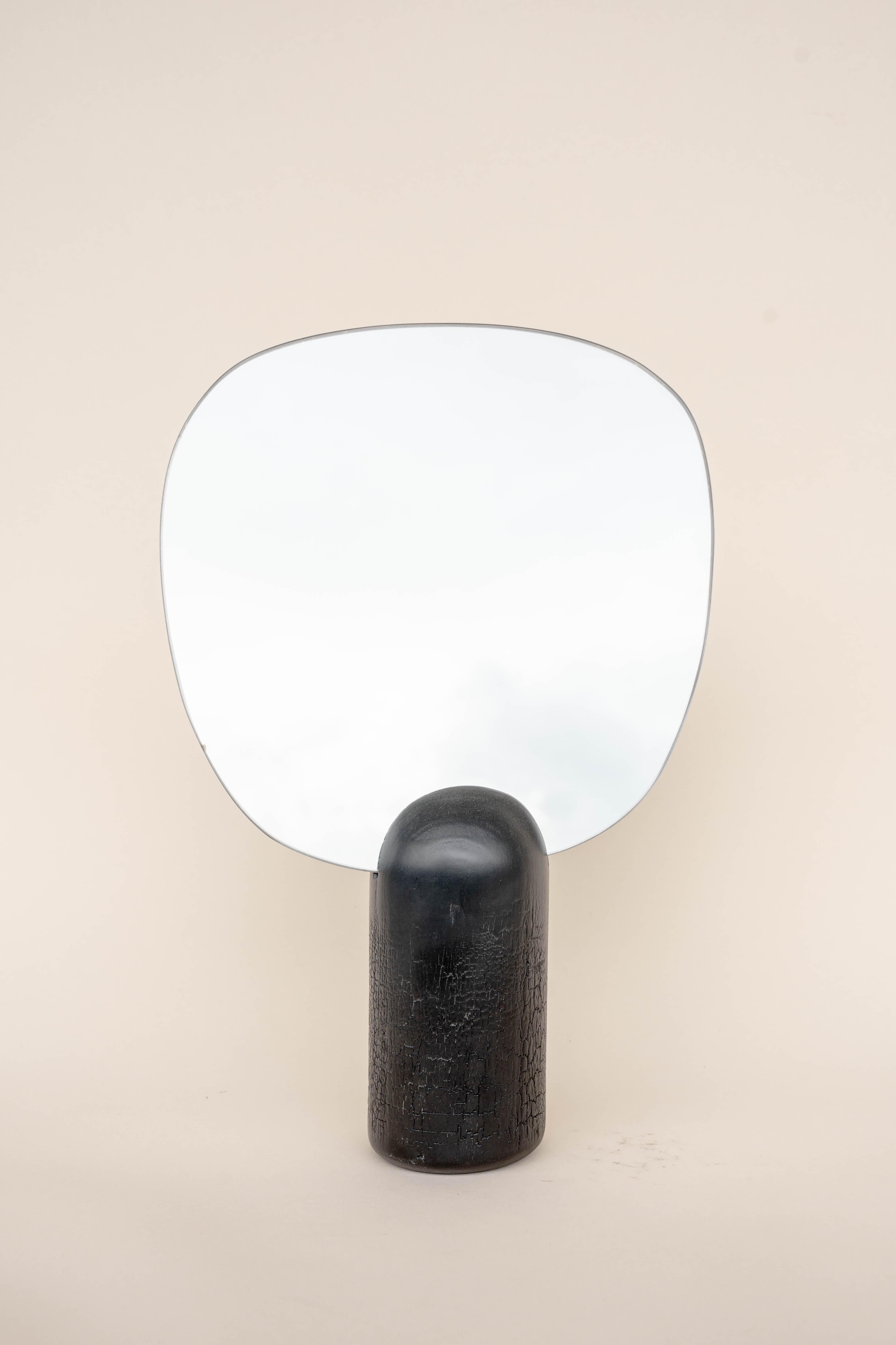 Burnt mirror by Daniel Elkayam
One of a Kind
Dimensions: D 10 x W 27 x H 42 cm 
Materials: Burnt beech wood


Jerusalem-born Art-designer and photographer based in Tel-Aviv. Operating in the field of sustainable home decor and specializing in