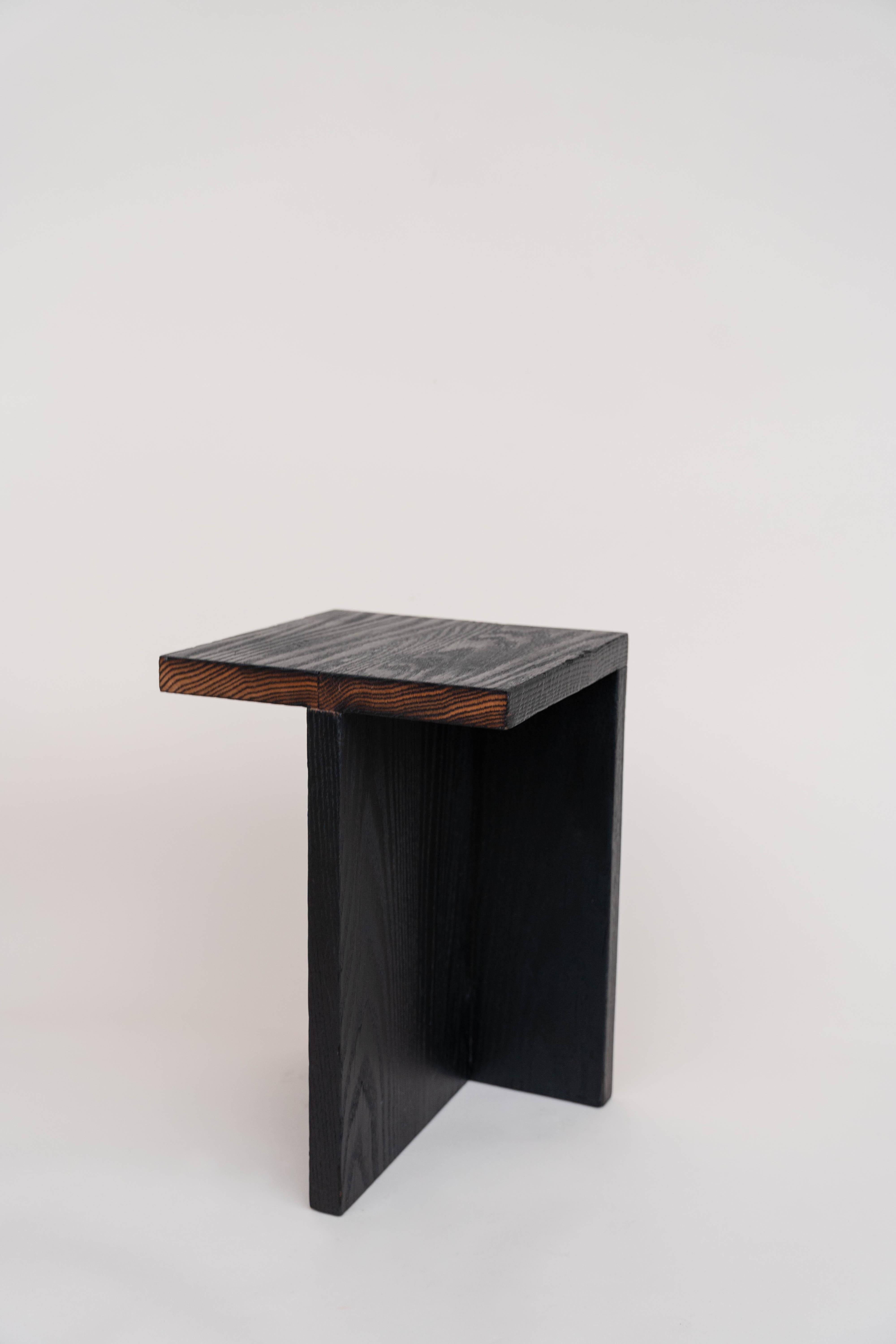 Burnt oak stool by Daniel Elkayam
Edition of 3
Dimensions: D 30 x W 30 x H 45 cm
Materials: Oak Wood

The Charred Collection
A collection of handmade wooden objects inspired by one of the most powerful natural phenomena in our world, which is out of