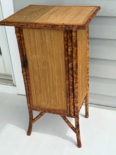 Burnt or Tortoiseshell Bamboo and Grasscloth Cabinet with a Shelf