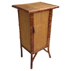 Burnt or Tortoiseshell Bamboo and Grasscloth Cabinet with a Shelf