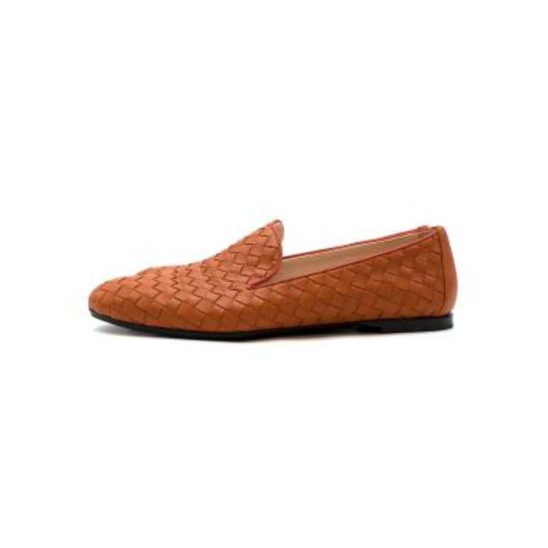 Bottega Veneta burnt orange Intrecciato leather loafers
 
 
 
 - Signature Intrecciato woven leather in a rich rust hue
 
 - Almond toe 
 
 - Smooth sole with low stacked heel
 
 - Leather lined
 
 - Grosgrain edging 
 
 
 
 Materials
 
 100%