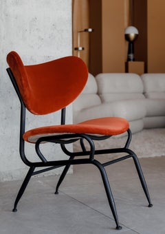 Burnt orange midcentury chair in style of Gastone Rinaldi