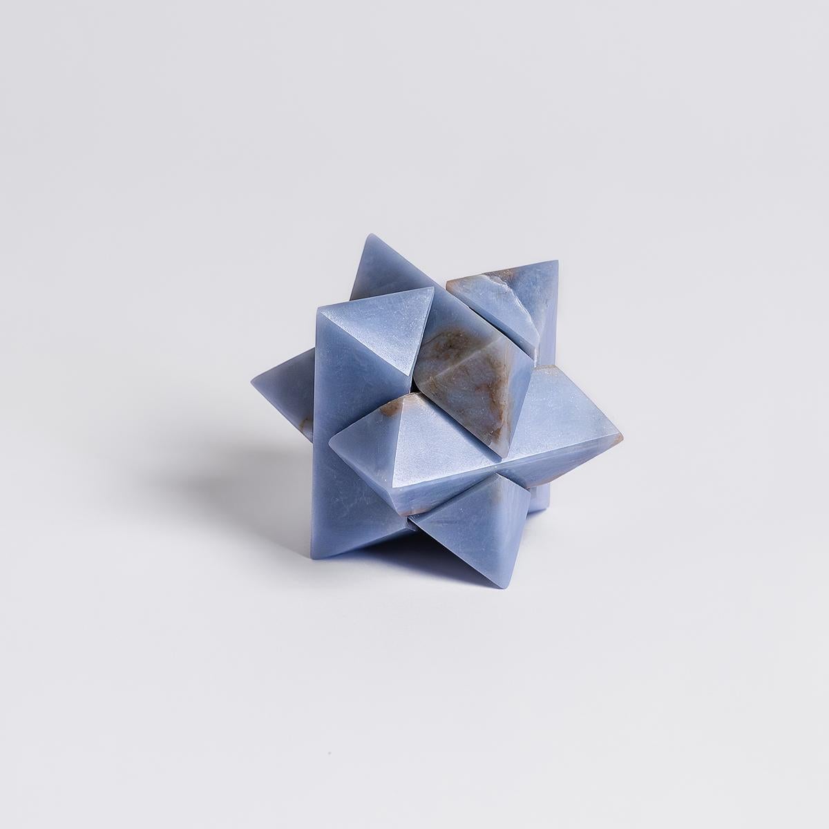 3D Angelite puzzle: an artisanal piece blending challenge and decor with positive energy.

The burr puzzle is of mysterious origin, first seen engraved on the cover of Chambers's Cyclopaedia. A captivating three-dimensional creation crafted from