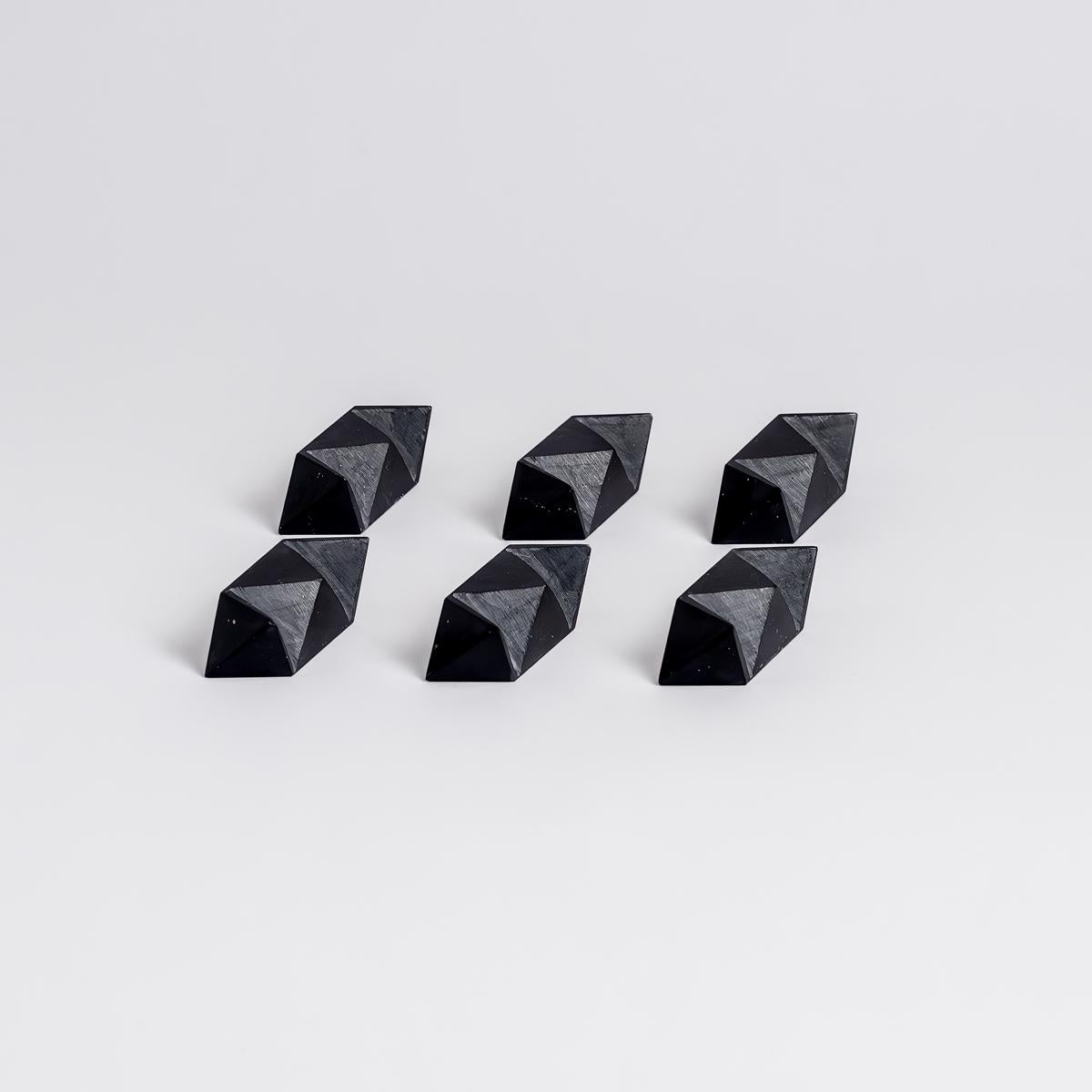 Add character to your space with a black onyx puzzle: functional art that surprises.

The burr puzzle is of mysterious origin, first seen engraved on the cover of Chambers's Cyclopaedia. A captivating three-dimensional creation crafted from