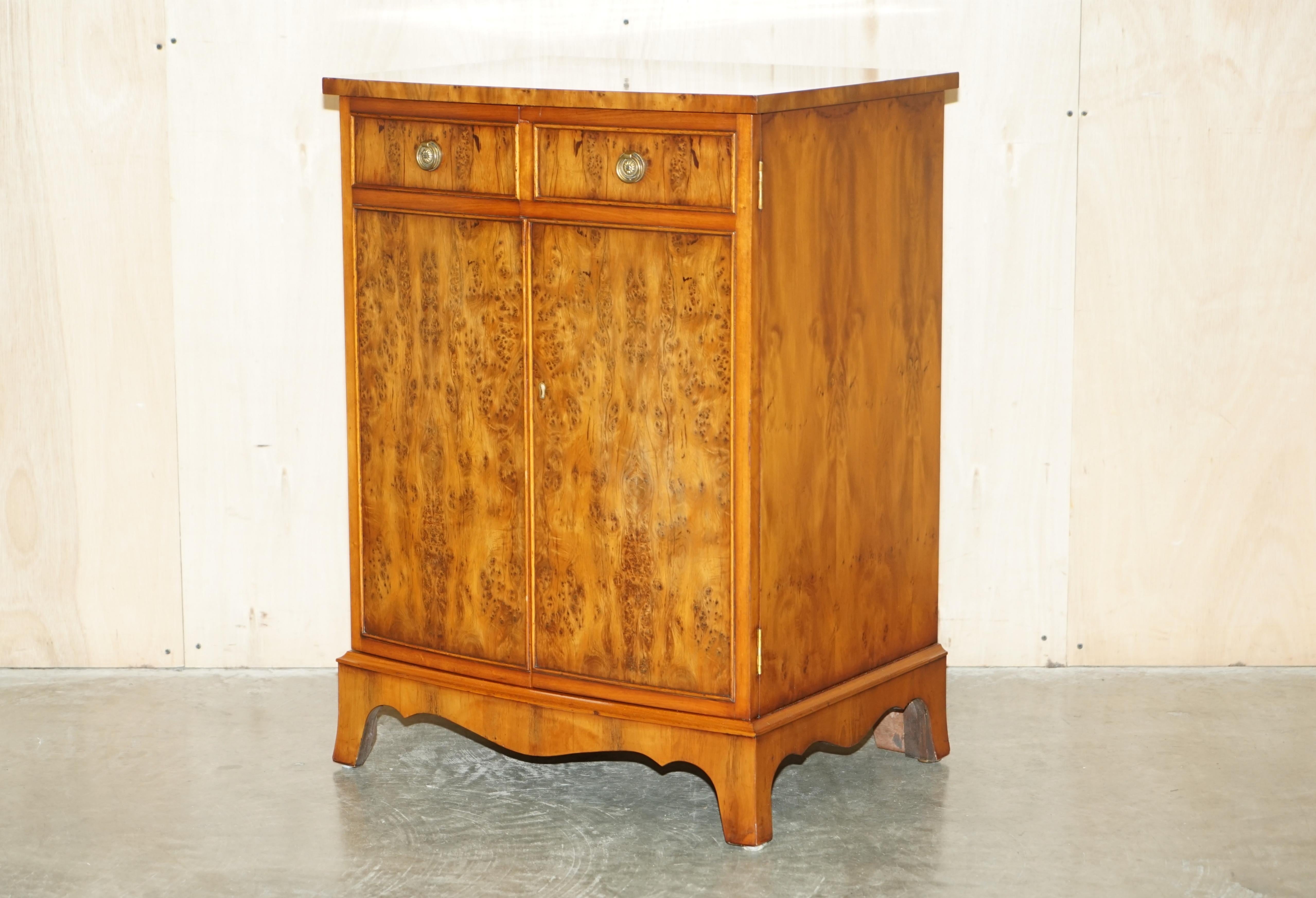 We are delighted to offer for sale this lovely vintage circa 1970’s Burr Walnut record player cabinet that can also be used as a drinks cabinet 

What a cool thing…. On the outside you have the never out of style burr walnut side cupboard, on the