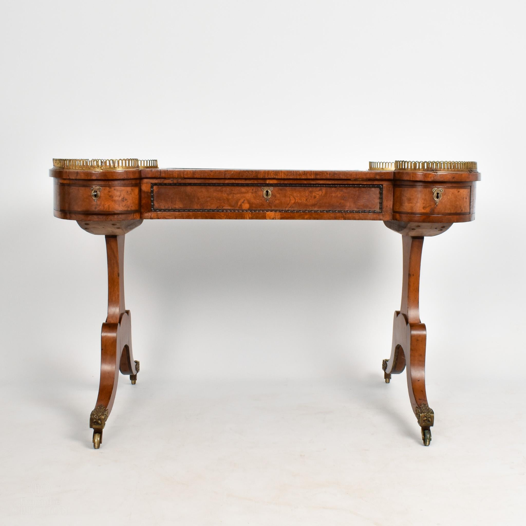 This unusual regency burr oak writing desk is of exceptionally fine quality. The skiver raises towards you for ease of use. The piece is extremely rare due to the burr oak and in great condition. It really is a one off. Burr Oak is rare on a piece