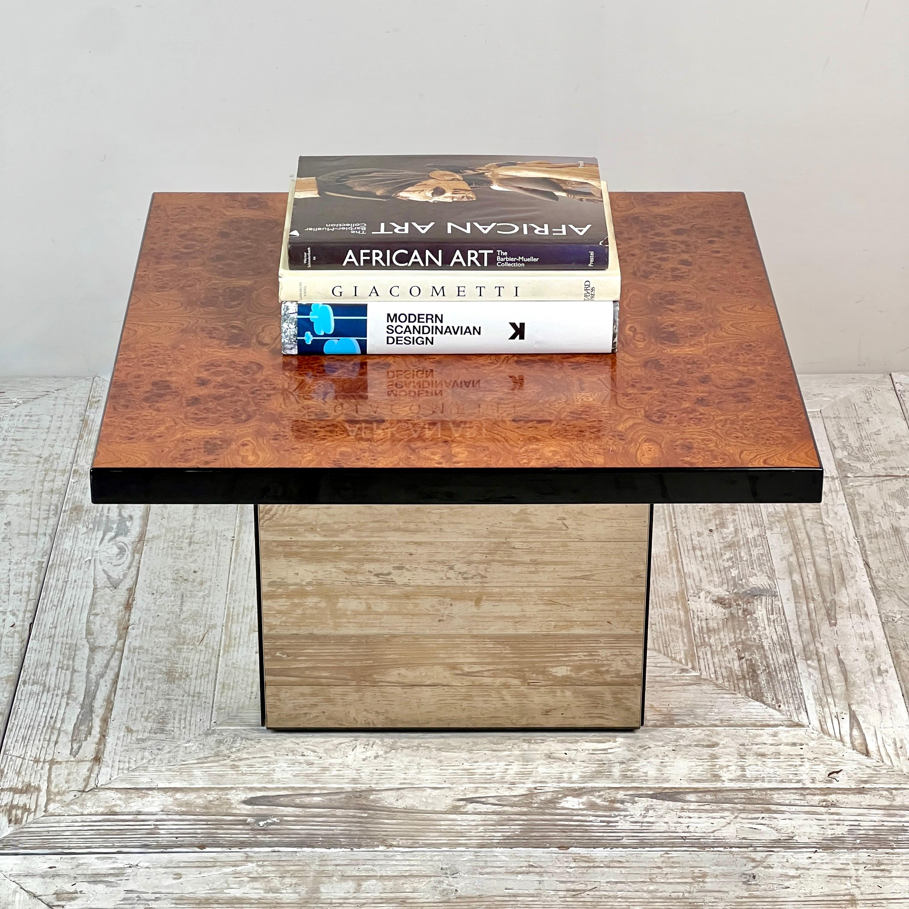 Paul Michel for Roche Bobois Burr Walnut Coffee Table

This smart coffee table offers understated elegance with its burr walnut veneer top, finished in a sleek high-gloss that highlights and protects the wood’s natural grain. The clean design is