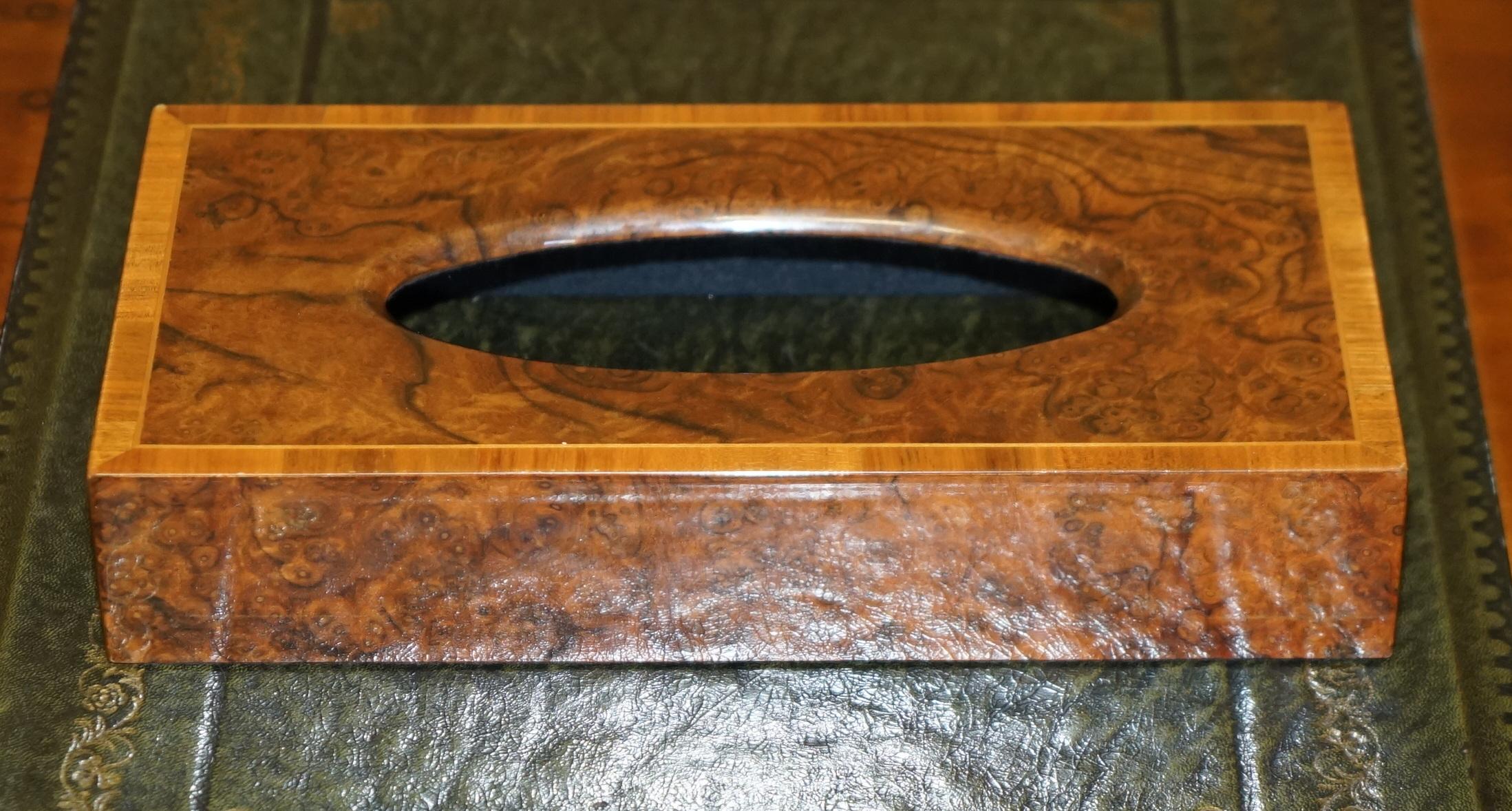Royal House Antiques

Royal House Antiques is delighted to offer for sale this lovely vintage David Linley style Burr Walnut with Satinwood boarder tissue box cover

A good looking well made and decoration tissue box, ideal for adding a sense of