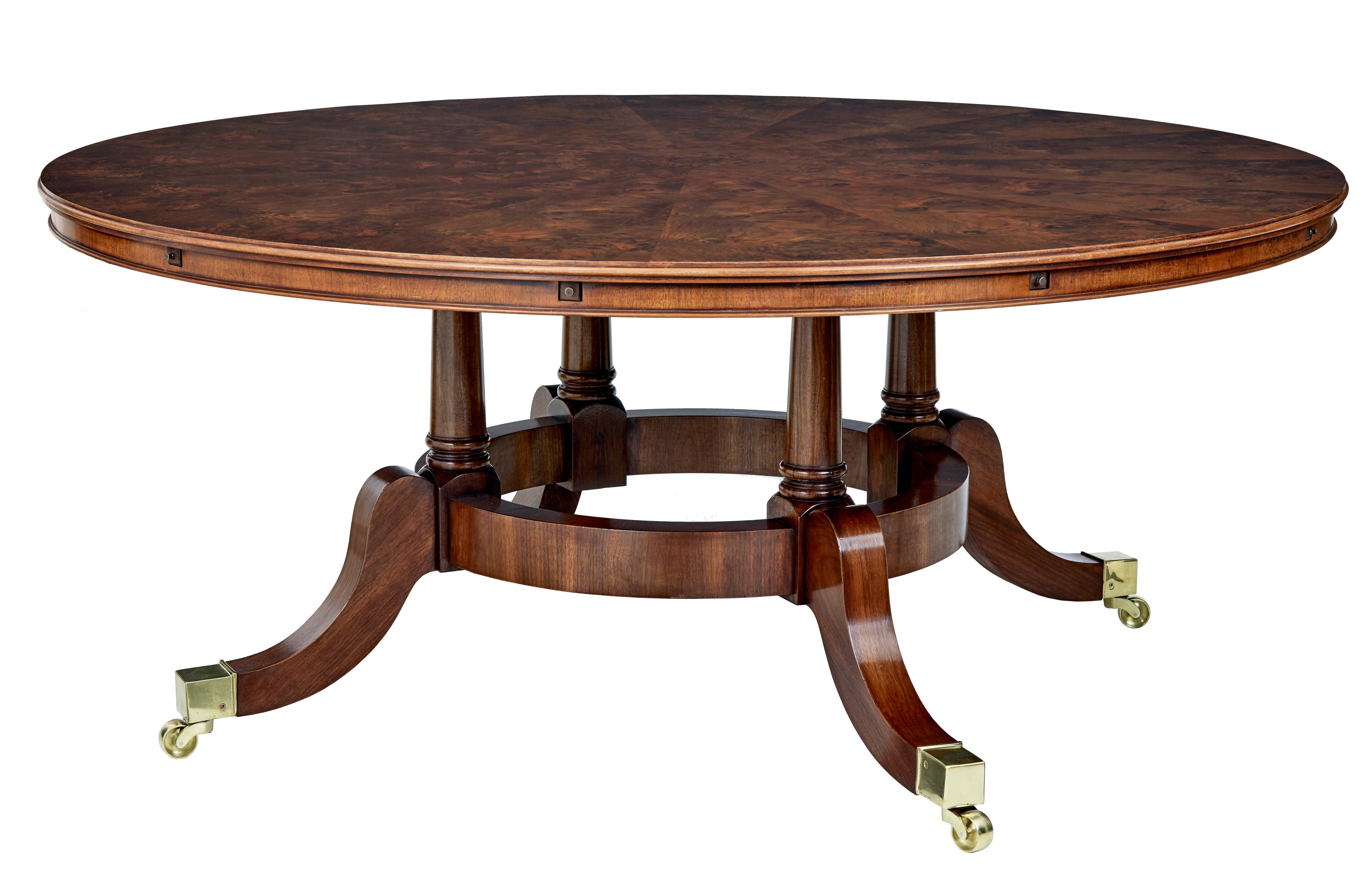 Burr walnut regency design jupe extending dining table.

Fine quality burr walnut table of grand proportions at over 100 inches in diameter and capable of seating 14 people in its extended form.

Veneered in stunning walnut which is arranged