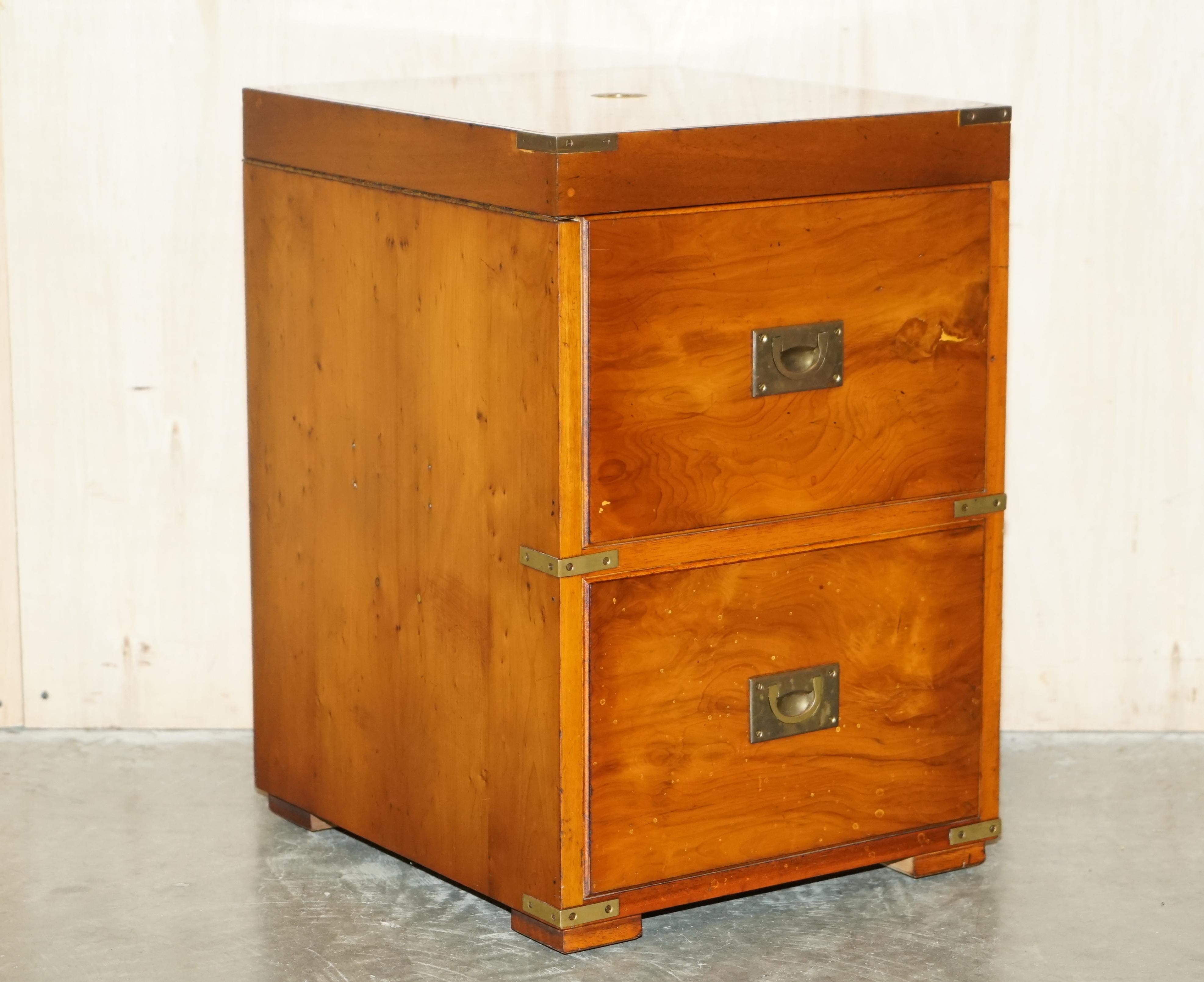 We are delighted to offer for sale this stunning Burr Yew & Elm Military Campaign side table sides drawers unit which houses a drinks cabinet

A very good looking well made and decorative piece, the drawers are faux and the whole piece is designed