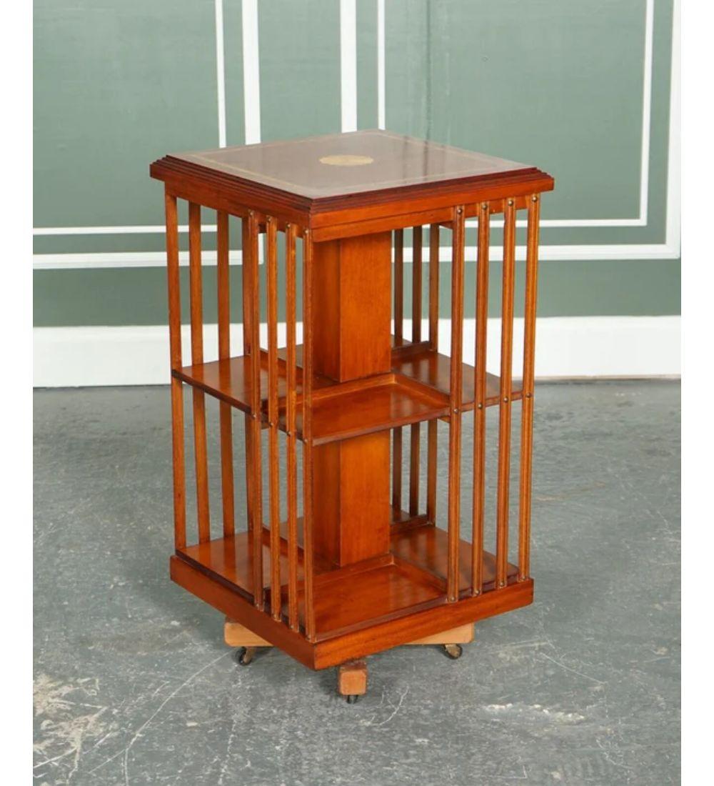 We are delighted to offer for sale a Stunning Yew Walnut Sheraton Revival Inlaid revolving bookcase end table.

This is a solid, very well made and decorative piece. It was made in the Sheraton revival style.

Lightly restored this by giving it