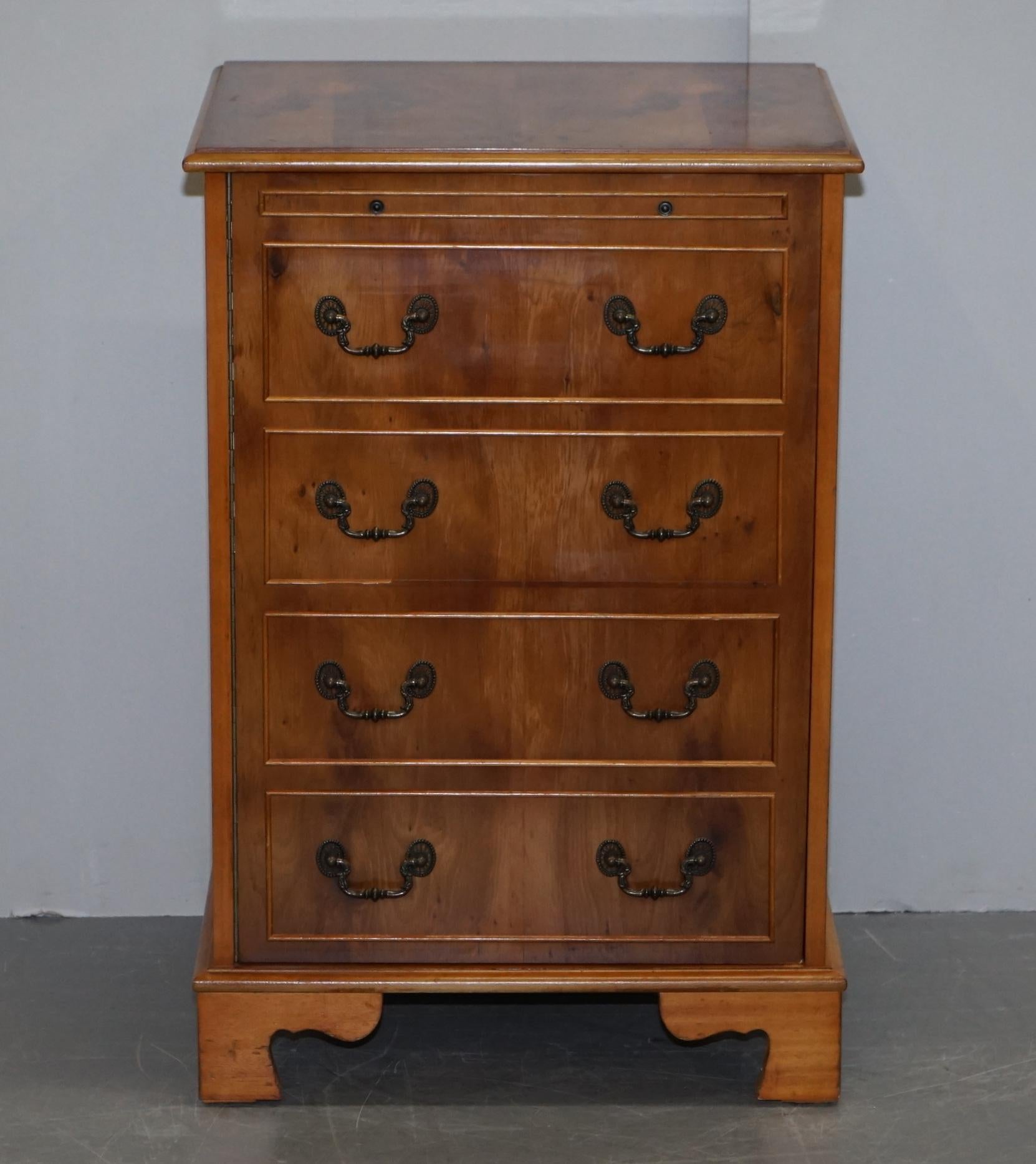 We are delighted to this lovely Record Player burr yew wood cupboard which is hidden as a Regency style chest of drawers

A very well made and decorative piece of metamorphic furniture, the top rises to reveal a space to hold a record player, the