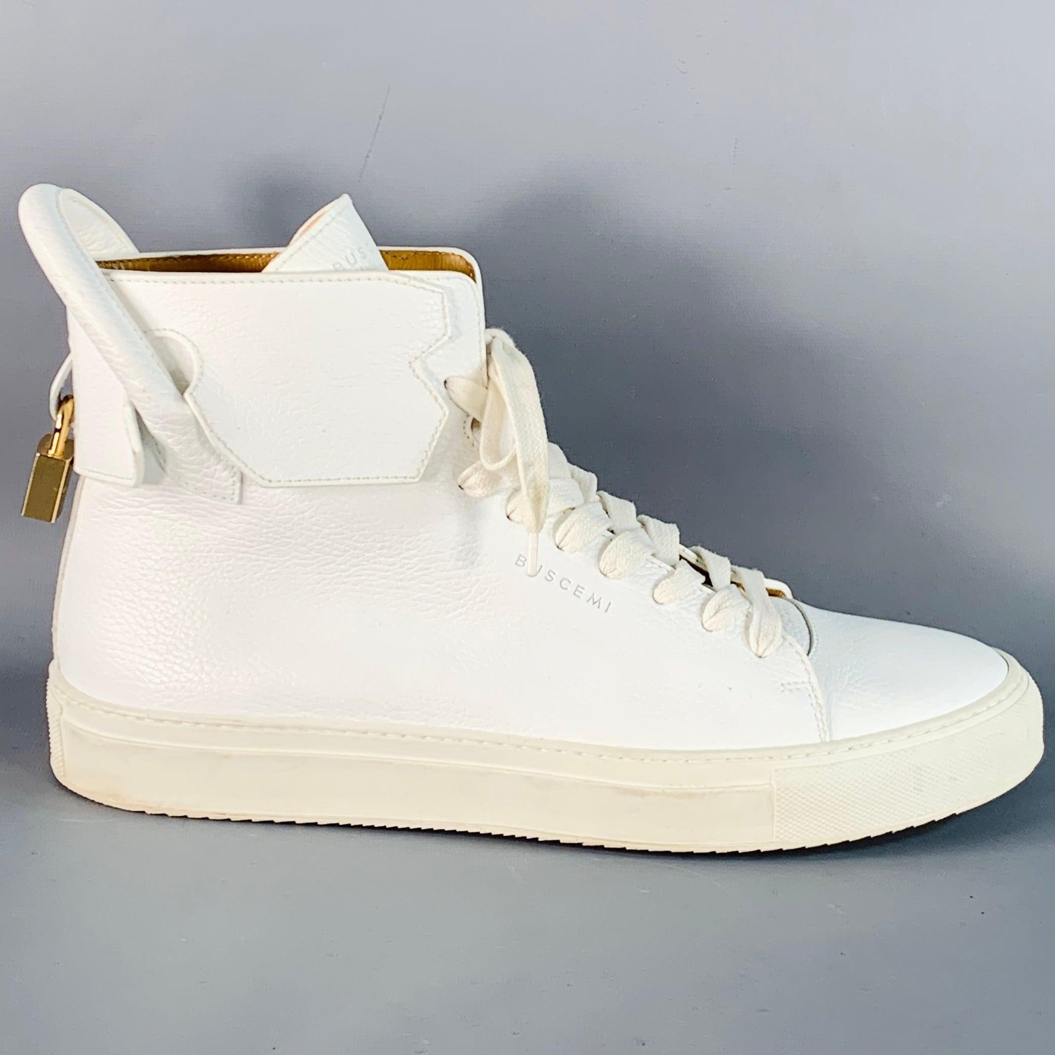BUSCEMI sneakers
in a white pebble grain leather featuring a high top style, gold tone metal lock details with key, and lace-up closure. Made in Italy.Very Good Pre- Owned Condition. Minor signs of wear. 

Marked:   IT 43Outsole: 11.75 inches  x 4
