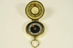 Brass nautical surveying compass from 1920 signed The Magnapole London