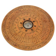Chinese geomantic wooden compass with magnetized needle in the center for Feng Shui