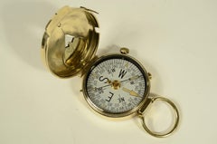 Brass magnetic pocket compass signed Plan Ltd Neuchatel Switzerland 1918