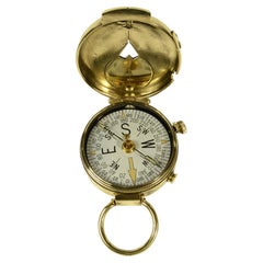Brass magnetic pocket compass signed Plan Ltd Neuchatel Switzerland 1918