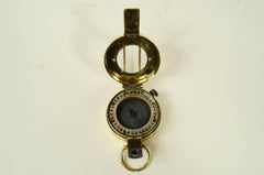 Prismatic surveying compass signed T.G. Co. Ltd London no. B312272 1945